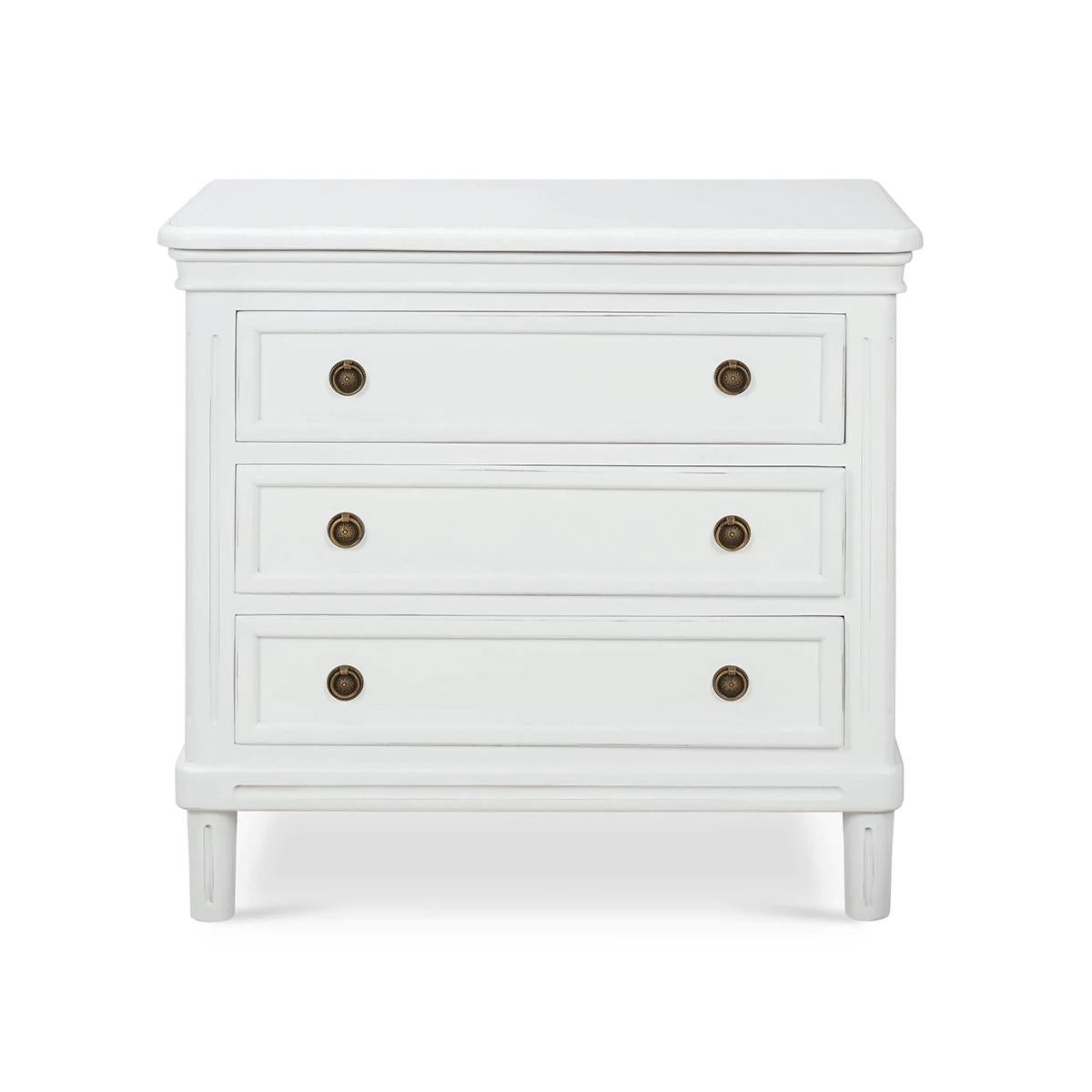 Crafted from solid mahogany, this nightstand offers long-lasting durability while showcasing a timeless rustic and neo-classic design. Its lightly distressed architectural white painted finish adds a touch of sophistication, creating a soft, elegant
