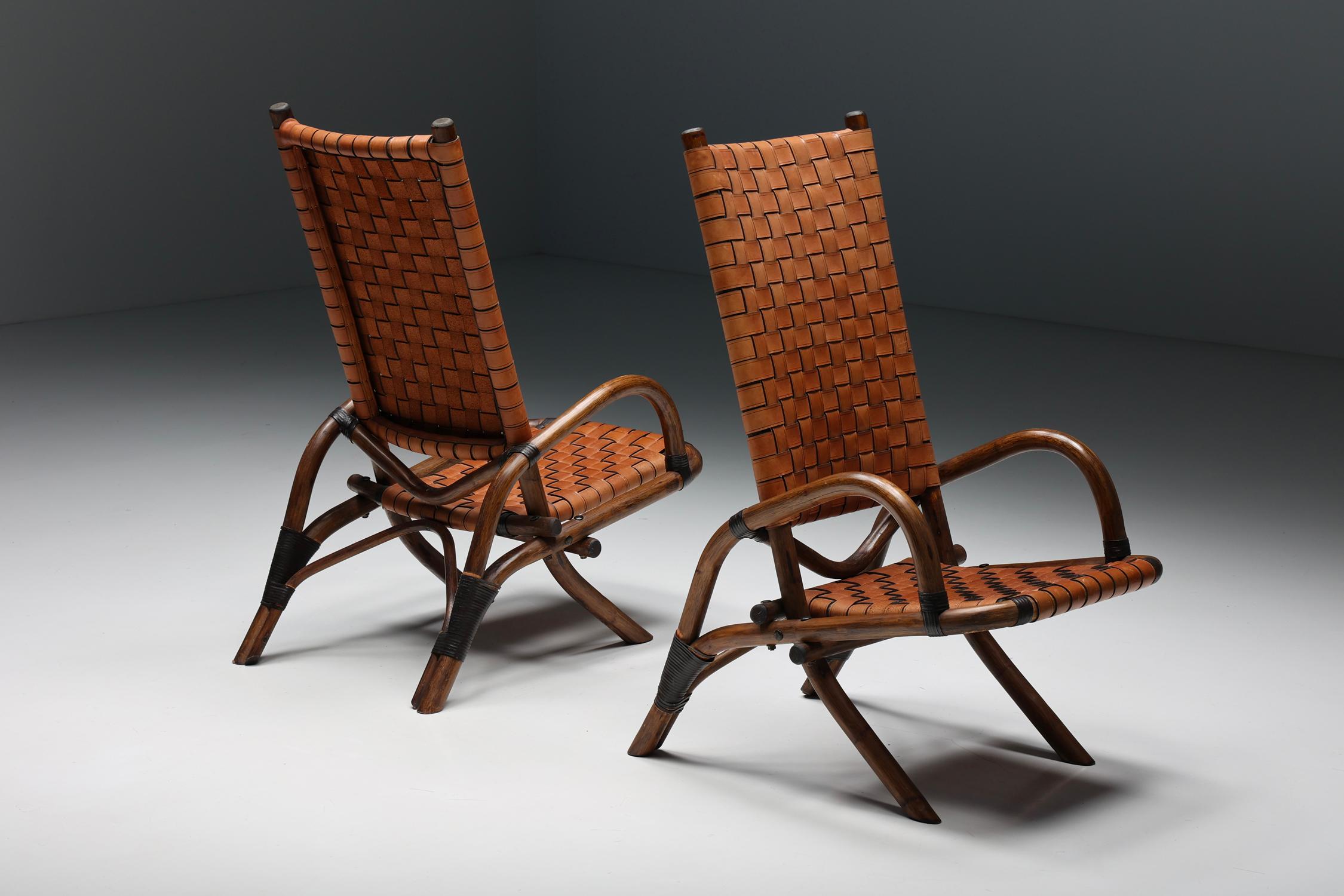 Armchairs; woven leather; bamboo; folding chairs; Mid-Century Modern; rustic; France; 1950s; 

Mid-Century Modern folding chairs with a tilted backrest and curved armrests. These armchairs are made of a bamboo frame with seating and backrest in