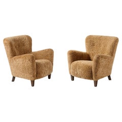 Pair of Ryo Lounge Chairs in Sheepskin by Dagmar