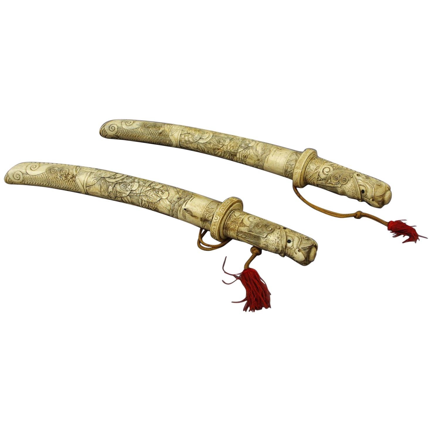 Pair of Sabers in Their Bone Sheaths, circa 1900