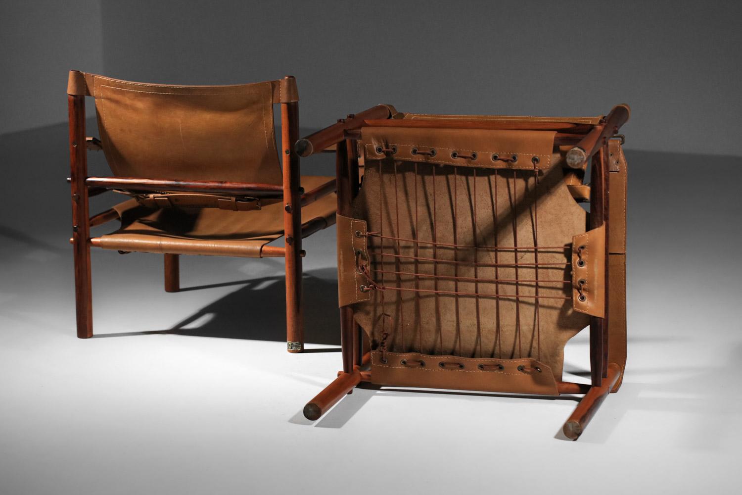 Pair of safari armchairs by Arne Norell in patinated leather and solid wood 12