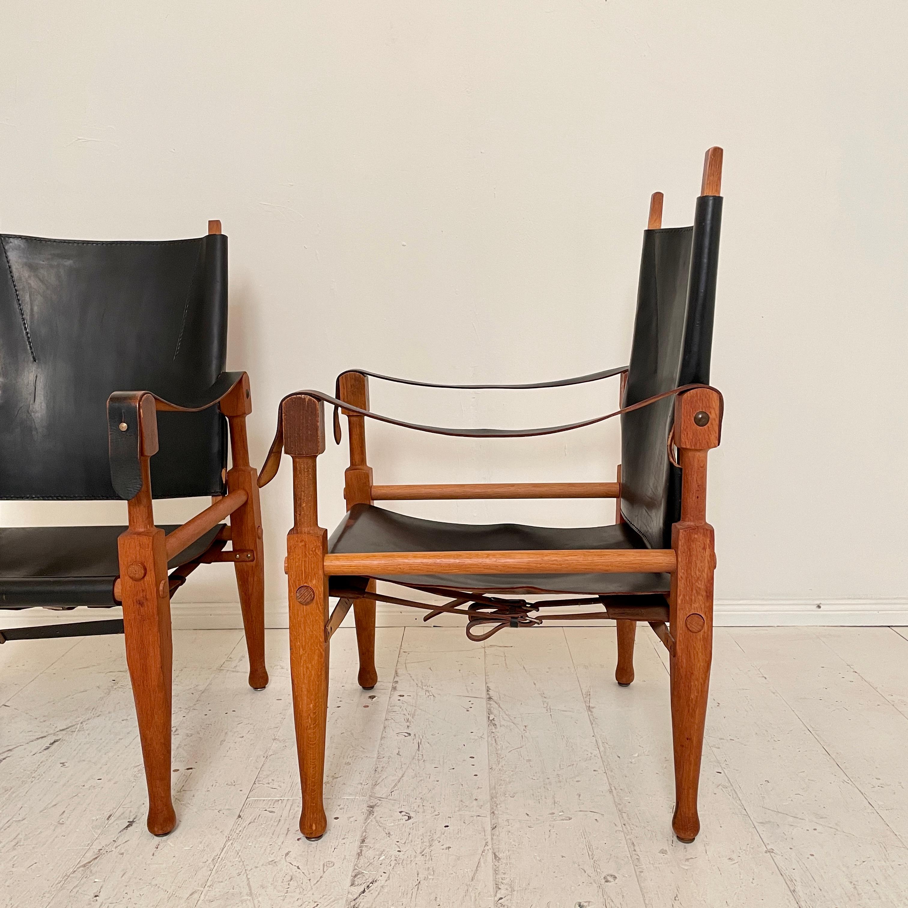 Mid-20th Century Pair of Safari Armchairs by Wilhelm Kienzle in Black Leather and Oak, 1950s