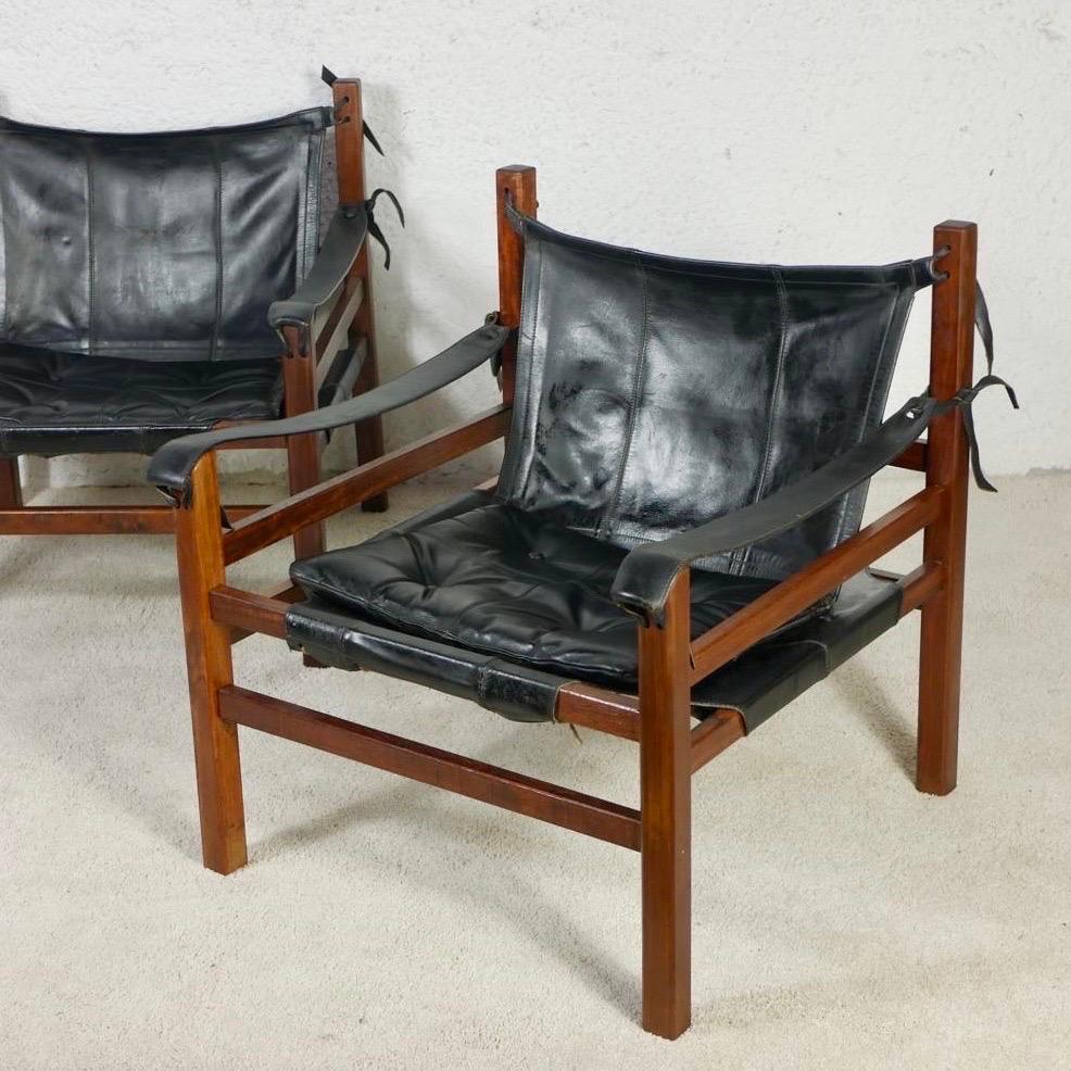 Mid-20th Century Pair of Safari leather armchairs in the style of Arne Norell, 1960s