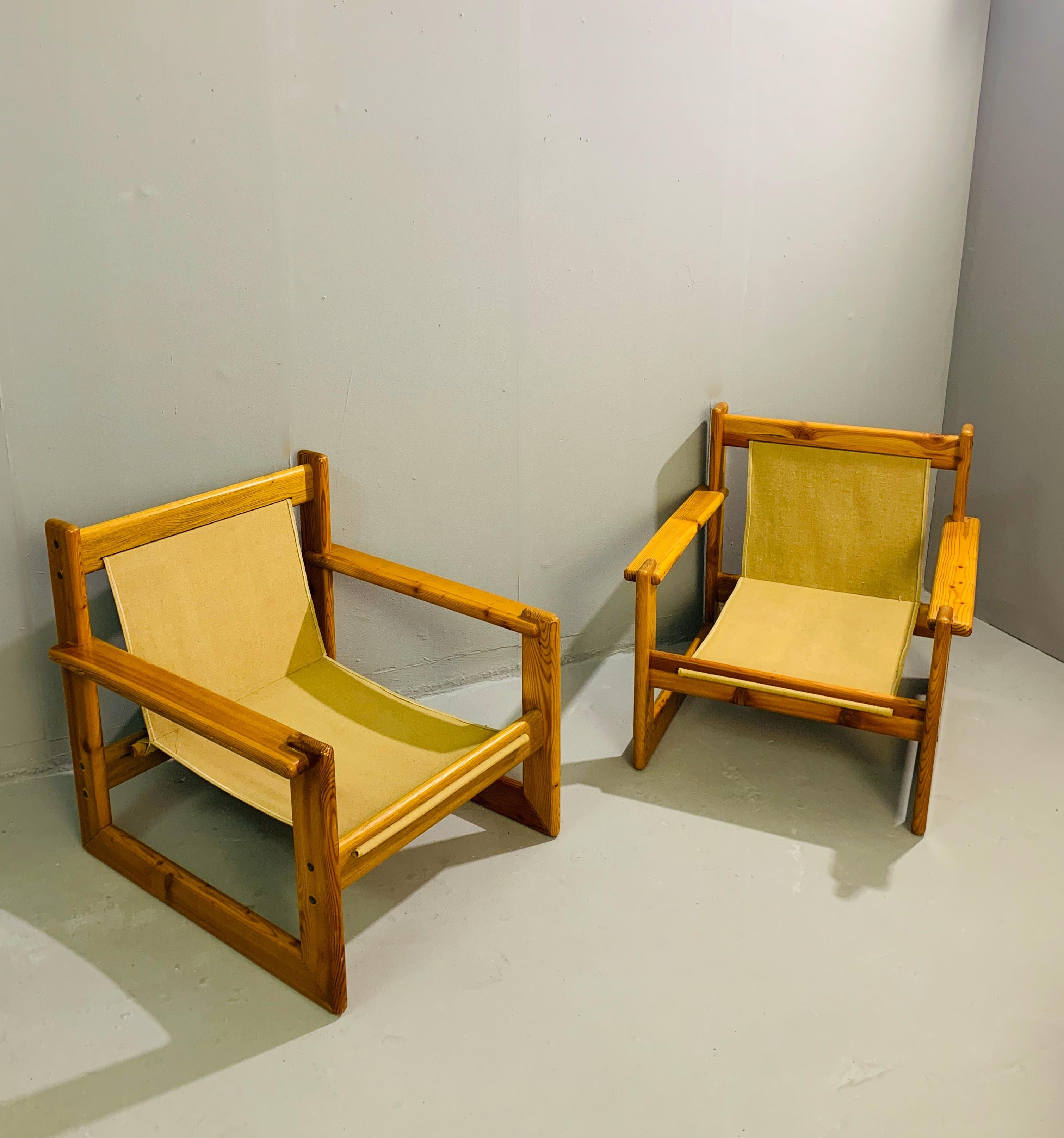 Pair of safari pine armchairs.