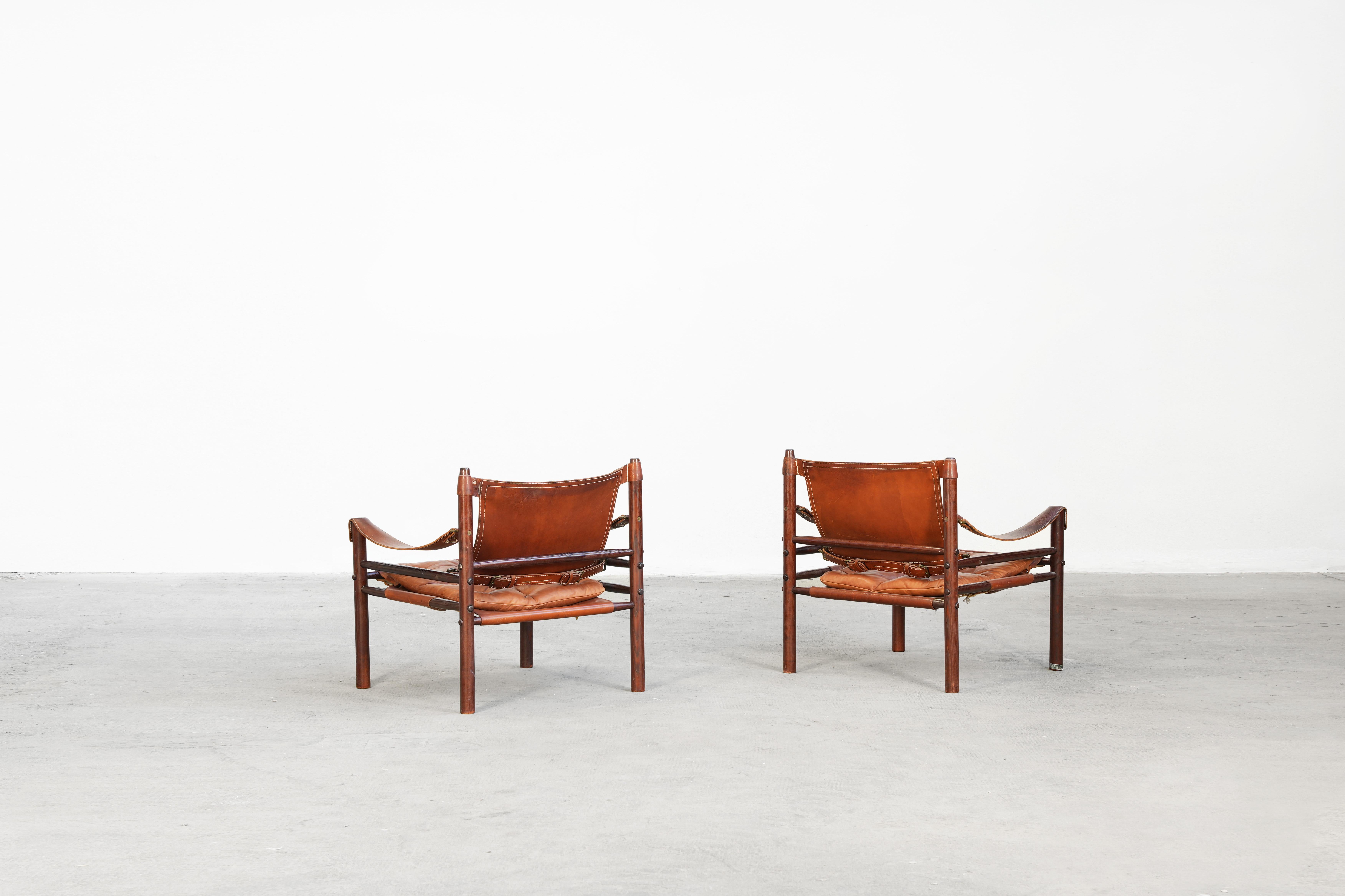 Swedish Pair of Safari Sirocco Chairs brown leather by Arne Norell for Norell AB, Sweden