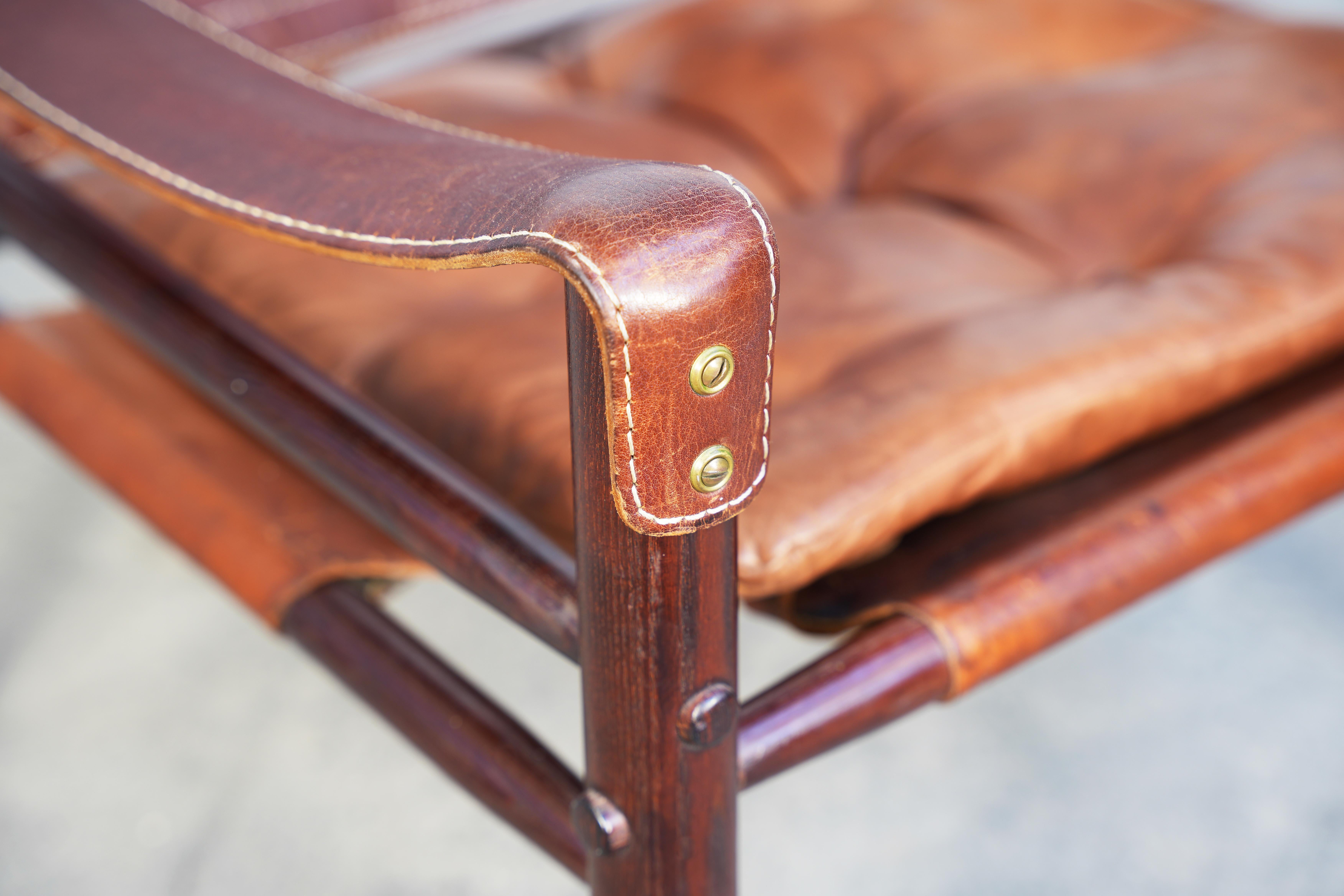 Leather Pair of Safari Sirocco Chairs brown leather by Arne Norell for Norell AB, Sweden