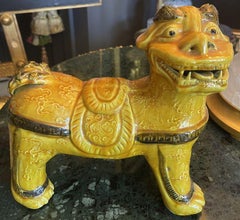 Pair of Saffron and Green Glazed Foo Dogs