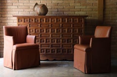 Pair of Saladino-style Leather Arm Chairs