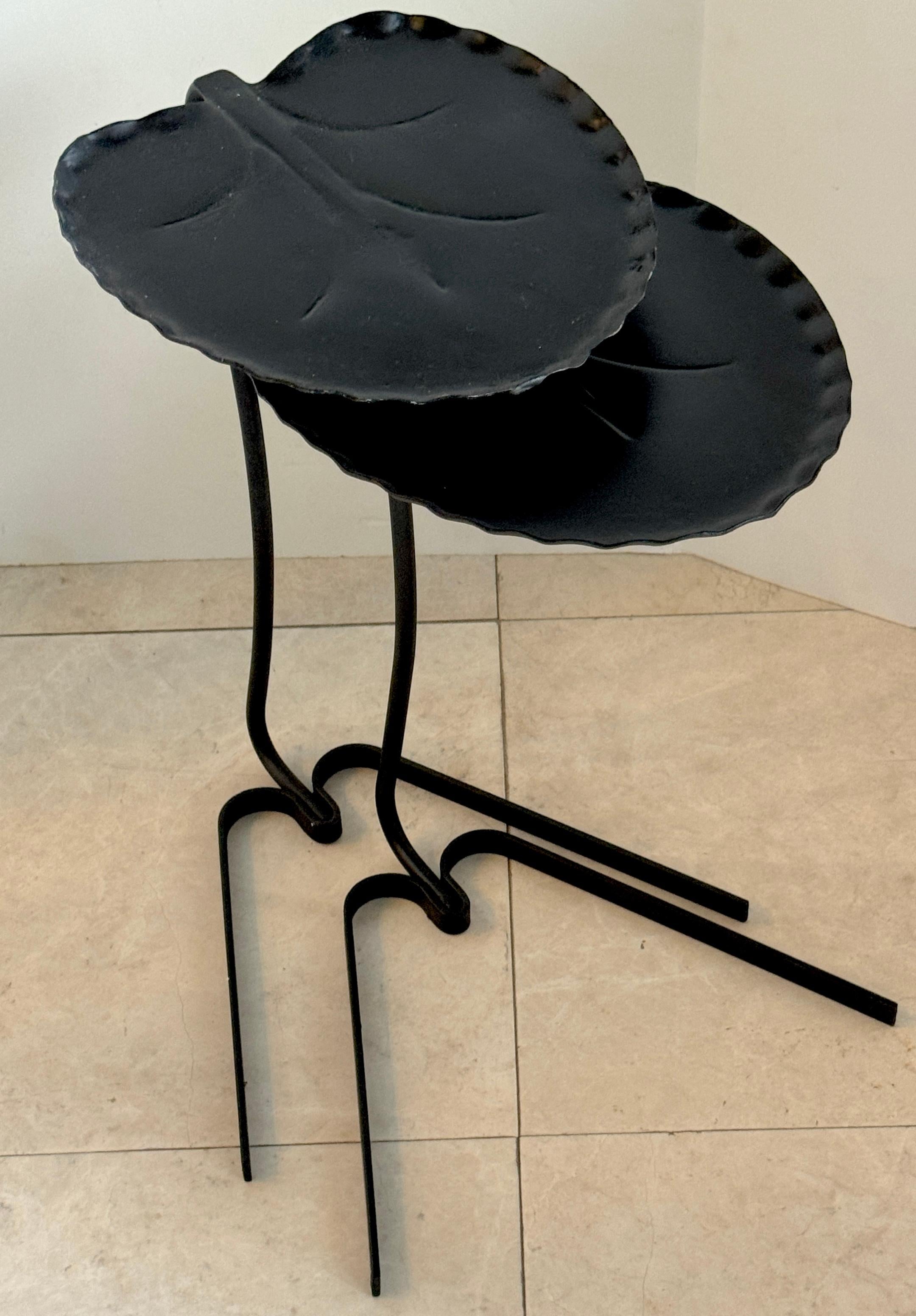 Pair of Salterini Lily Pad Nesting Tables
USA, circa 1960, designed by John Salterni 

A pair of Salterini Lily Pad nesting tables, designed by John Salterini in the USA circa 1960. These iconic tables feature a sculptural lily pad form and are