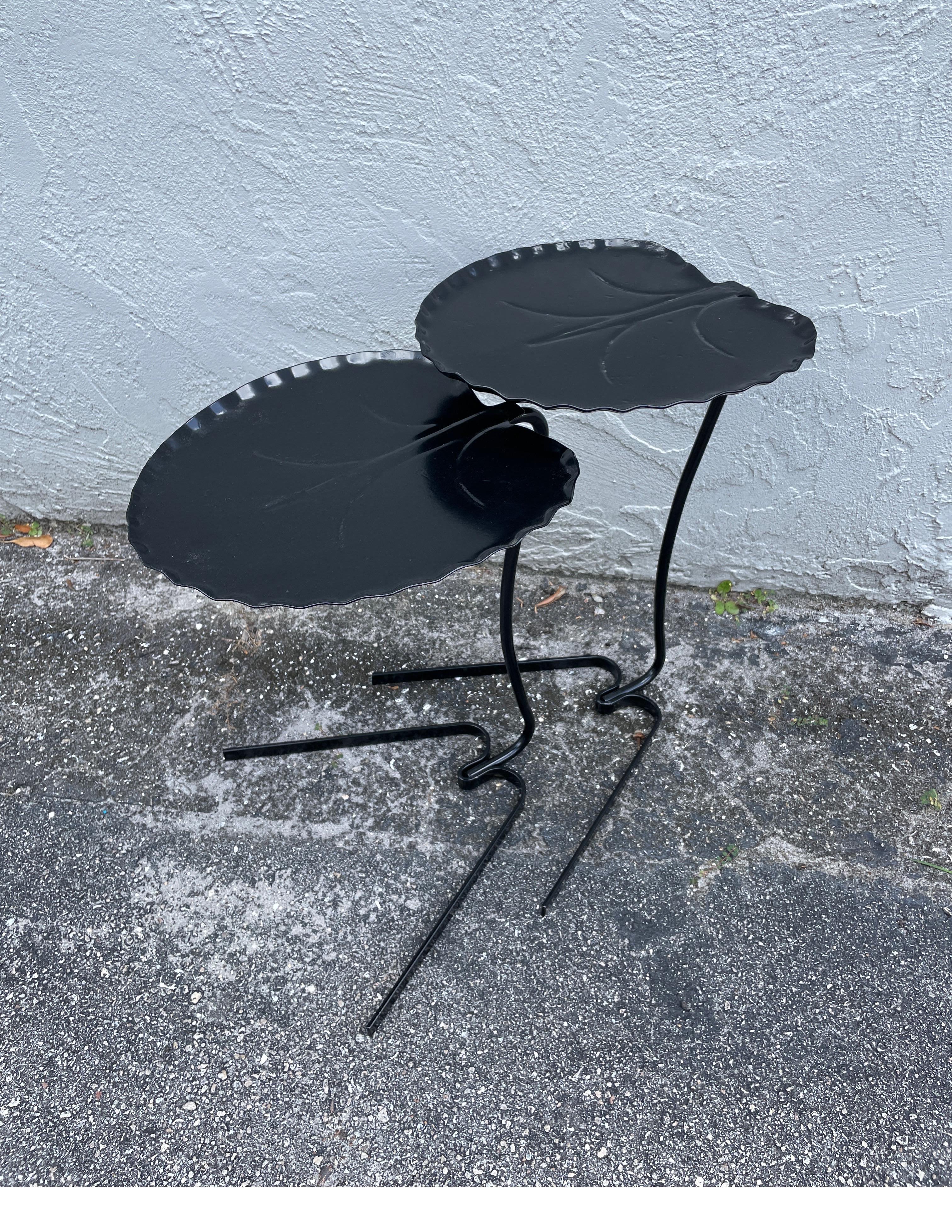 Pair of wrought iron lily pad nesting tables by Salterini. Newly powder coated.
Leaf size is 11