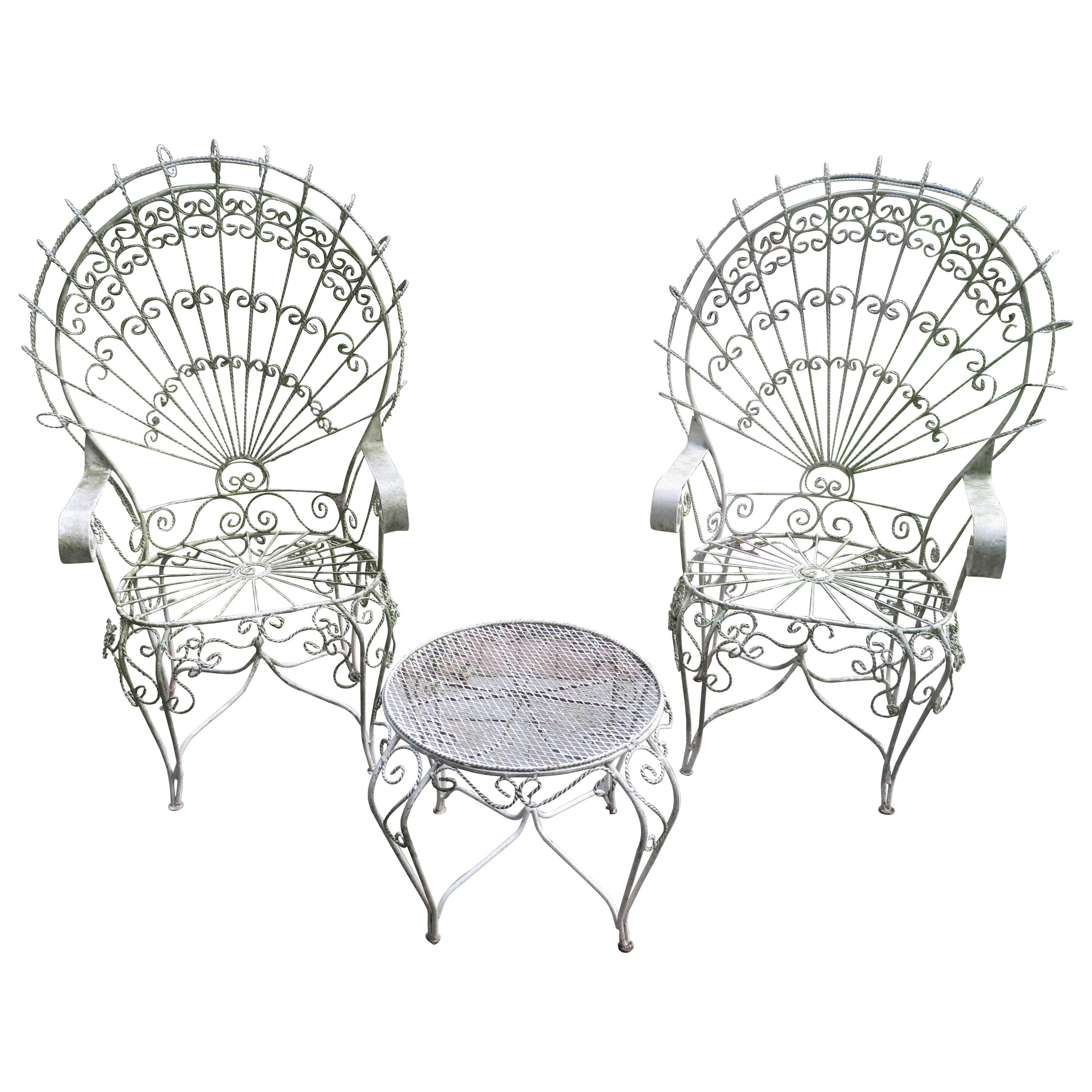 Pair of Salterini Style Wrought Iron Fan Back Peacock Patio Chairs and Table