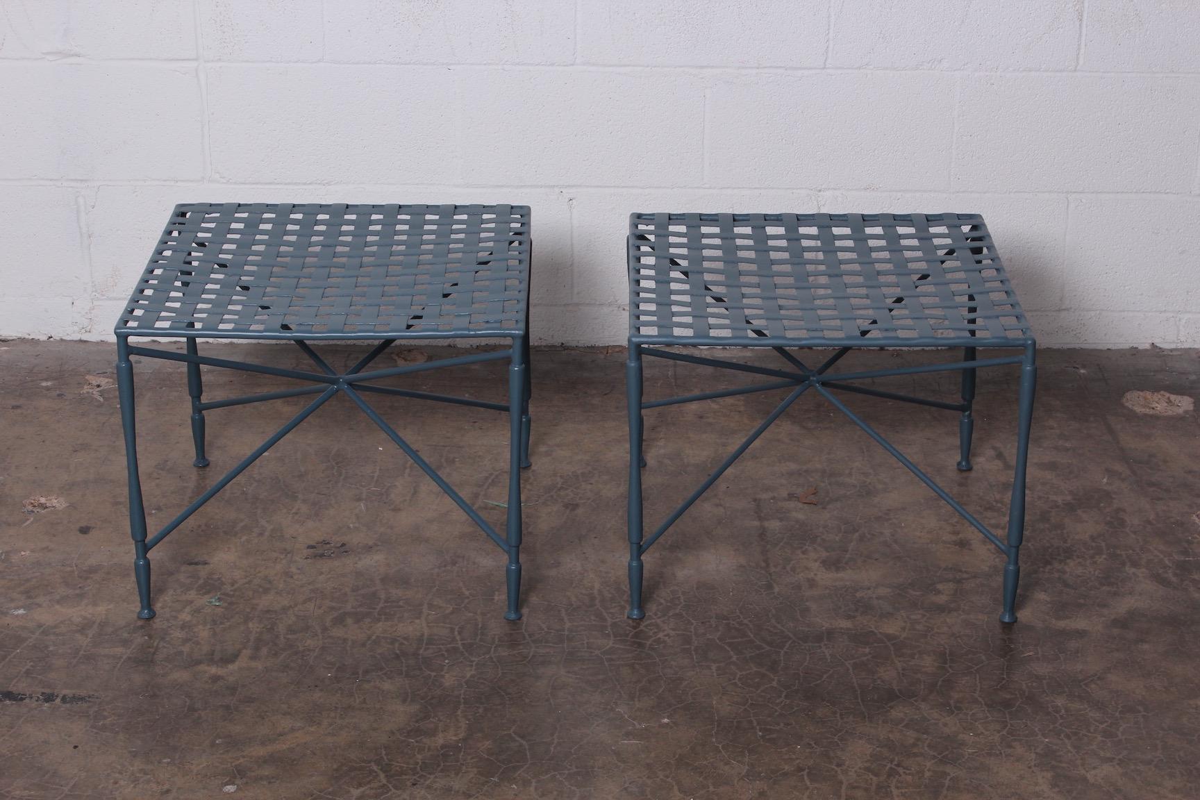 A pair of sculptural iron lattice top tables by Salterini. Newly powder-coated.