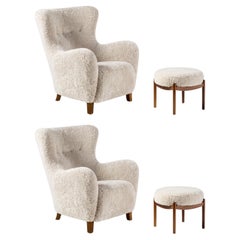 Pair of Sampo Sheepskin Wing Chair & Esko Stool Set by Dagmar