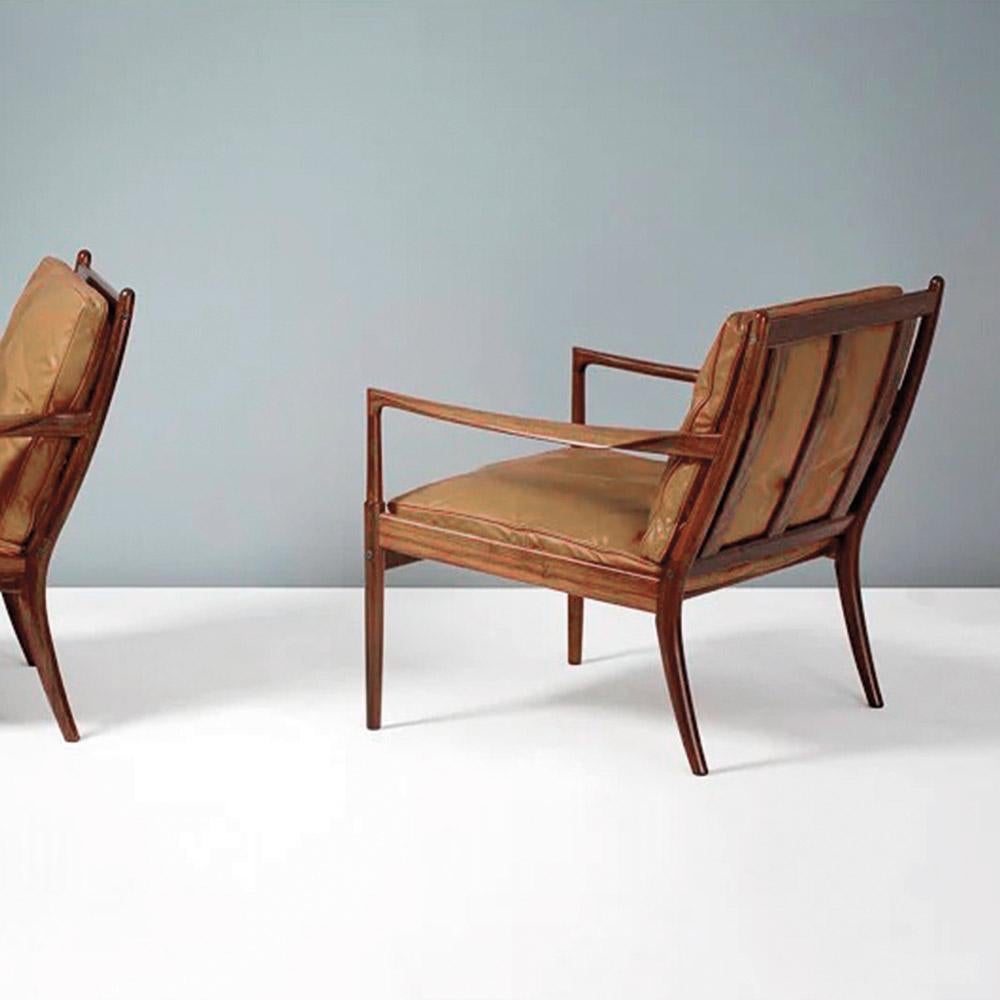 Magnificent and rare pair of lounge chairs “Samsö” by Kofod Larsen. It is a model almost as iconic as the Elizabeth armchair. His work became increasingly sought after the late 1950s, when he was commissioned by Olof Persson to produce a furniture