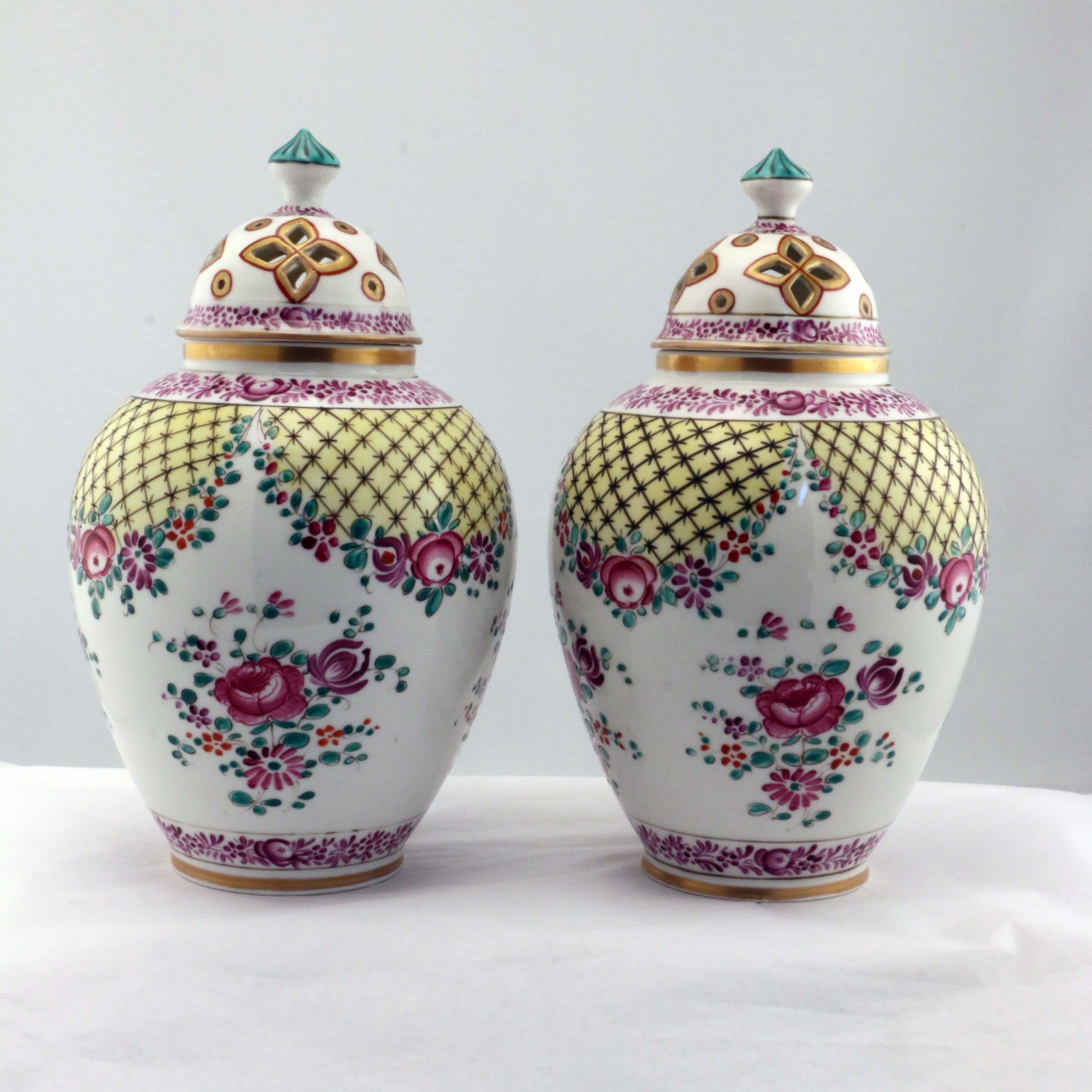 Edne Samson was famous for his imitations of other factories and has become collectible in his own right. Here he has produced a pierced cover on a ginger jar shape, painted in a Chinese export style in puce, lattice and polychrome, and marked with