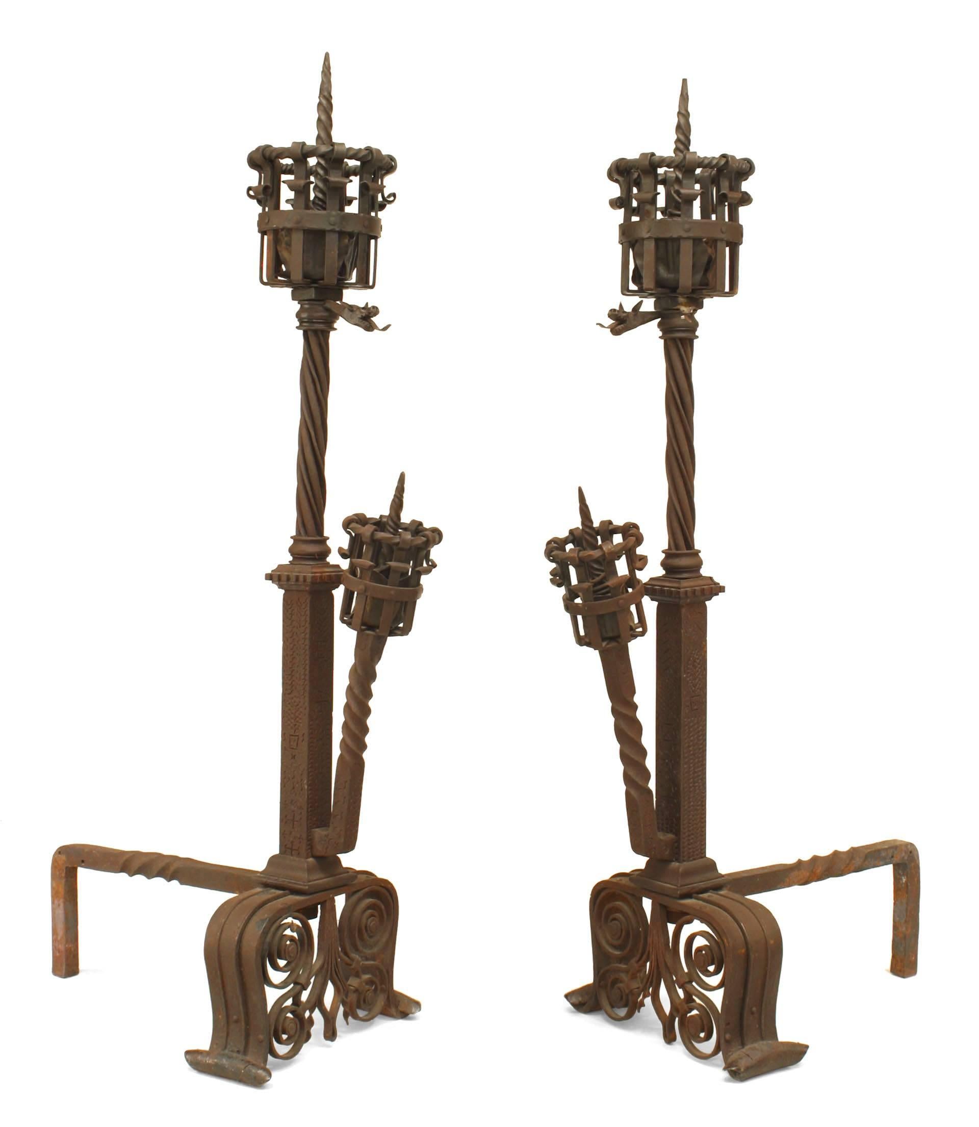 Pair of Italian Renaissance-style wrought iron andirons with an upper and lower spike & basket design with open scroll base & griffins supporting a cross bar (Attributed to SAMUEL YELLIN) (PRICED AS Pair)
