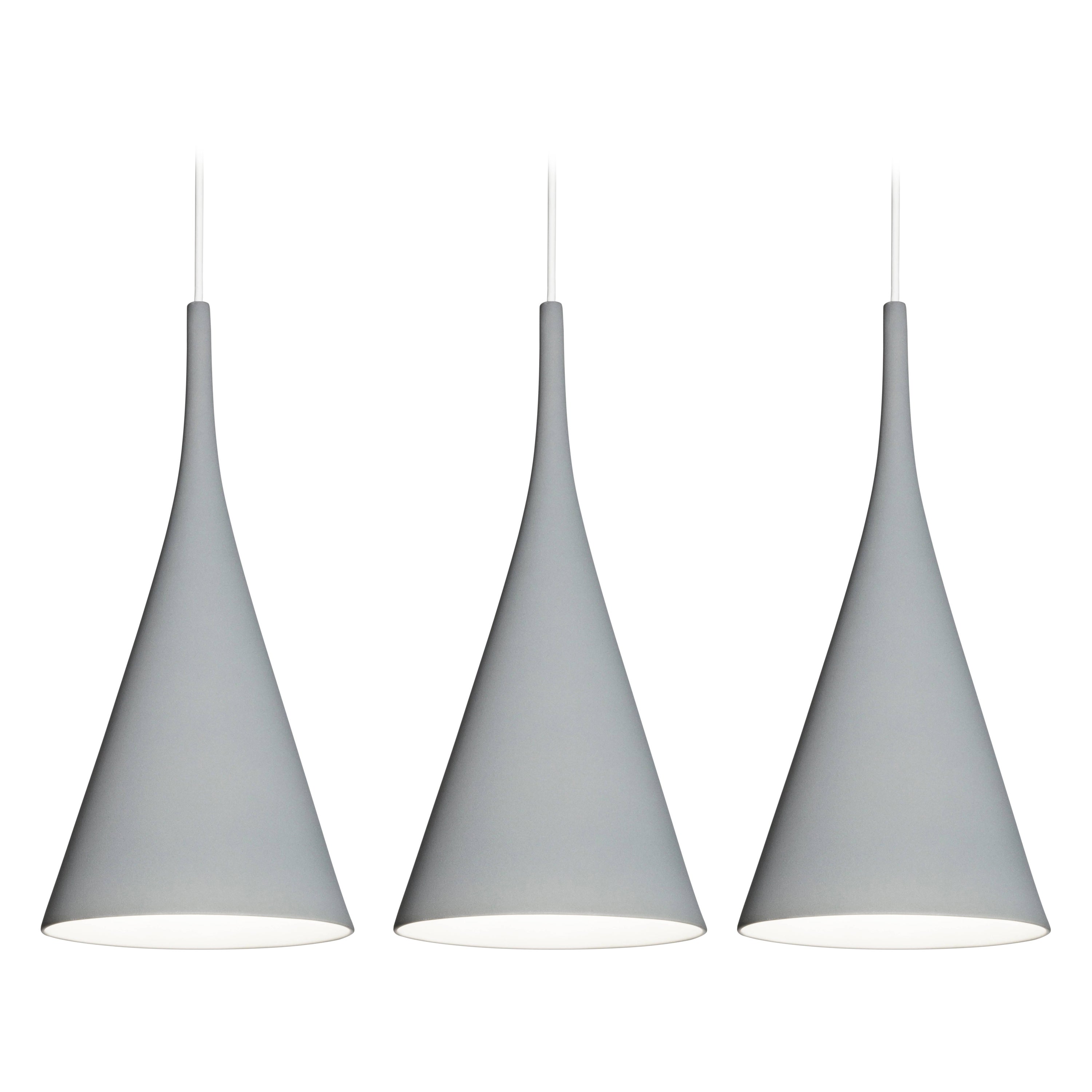 Pair of Samuli Naamanka 'Lambada' Ceramic Pendants in Grey for Innolux.

Designed by the internationally renowned Naamanka in 2013 and manufactured in Finland through artful hand casting. The minimal and refined shape and a smooth matte ceramic