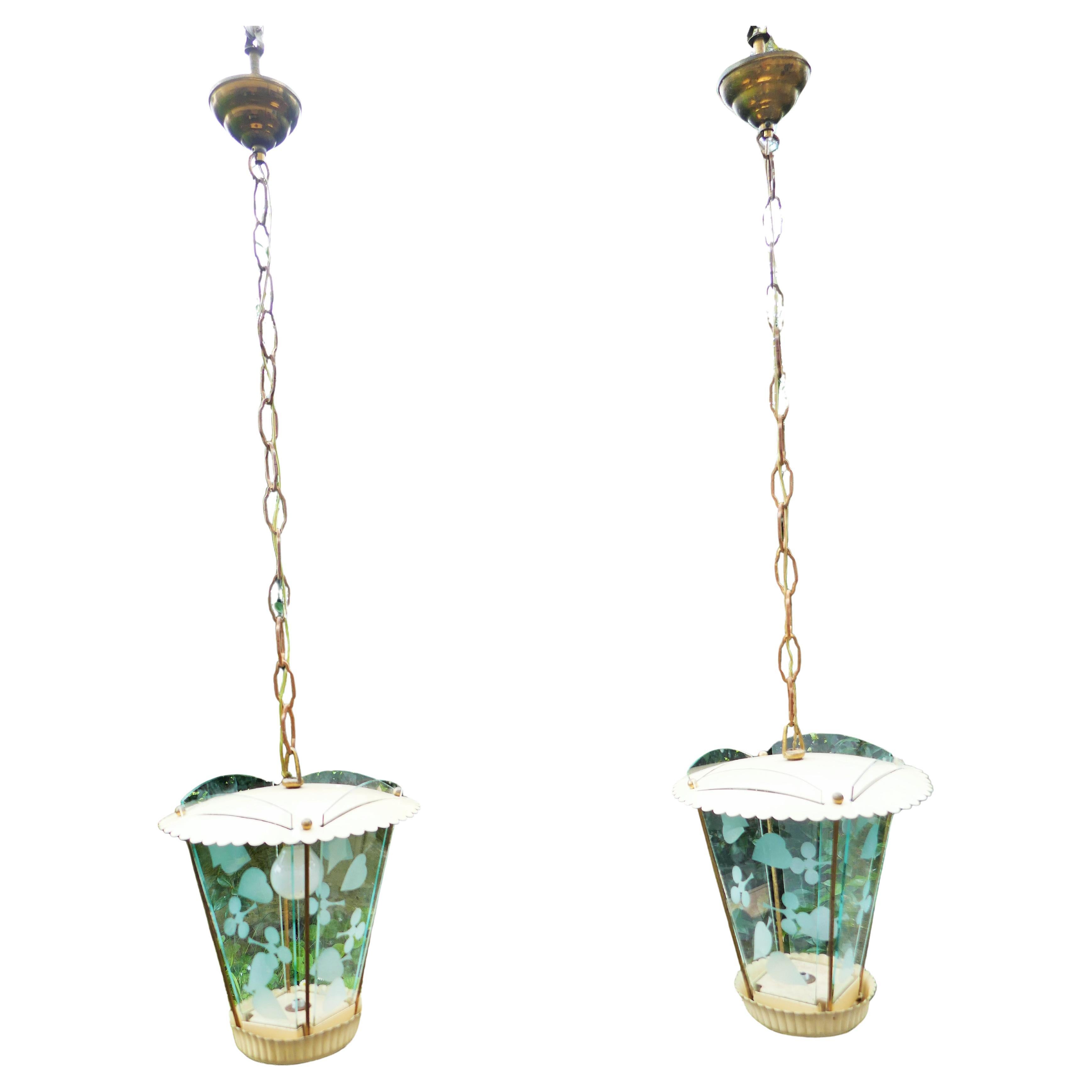 Pair of lanterns with sandblasted glass with playing card suits.
Glass in good condition and structure with signs of aging.
Thank you