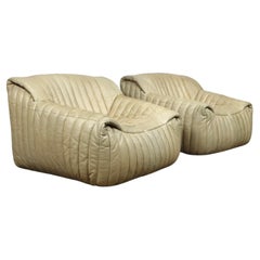 Pair of Sandra lounge chairs in cream leather by Anne Hieronimus for Cinna, 1970