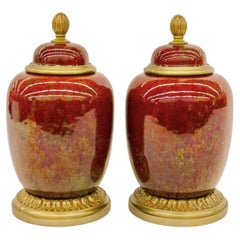 Pair of Sang de Boeuf Flambé Bronze Mounted Sevres Styled Garniture Jars or Urns