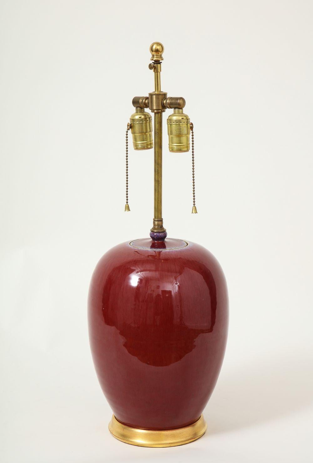 20ième siècle Paire de lampes de table en porcelaine de Sang de Boeuf en vente