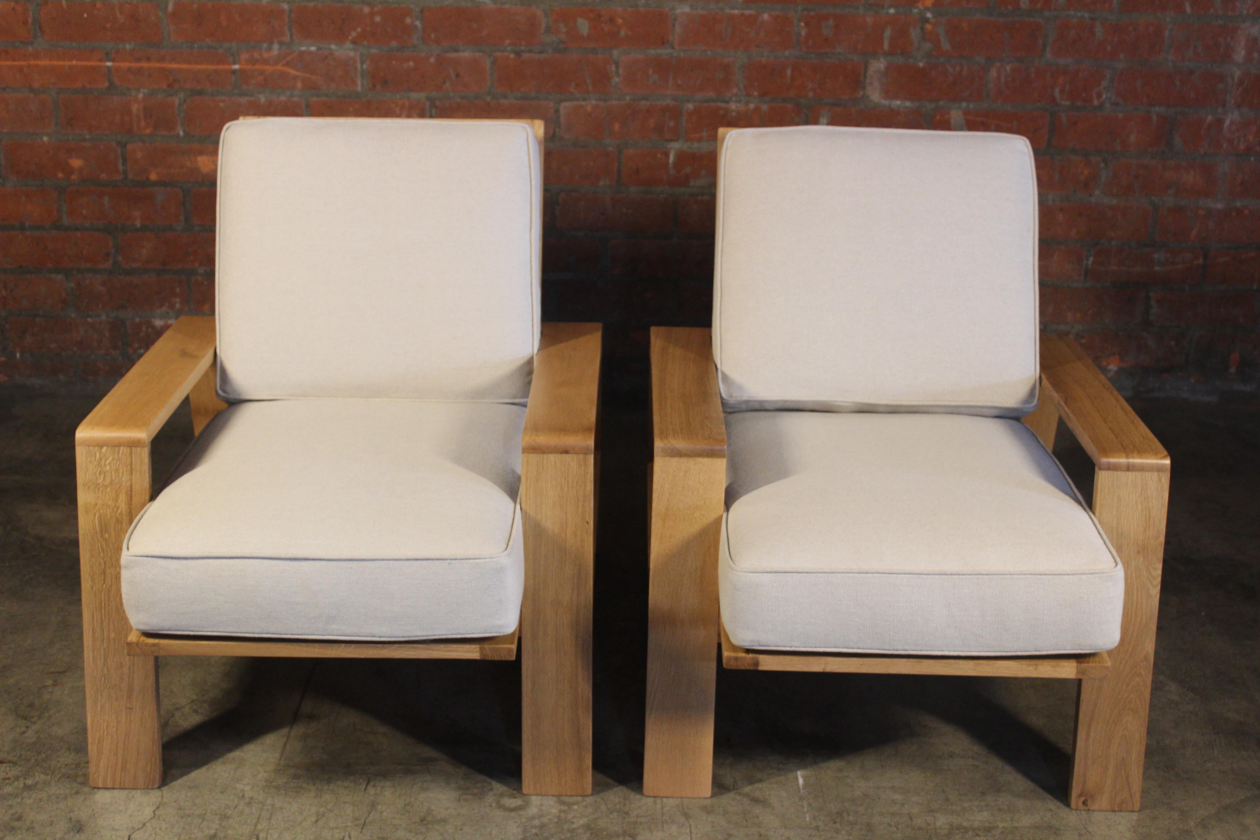 wooden armchairs with cushions