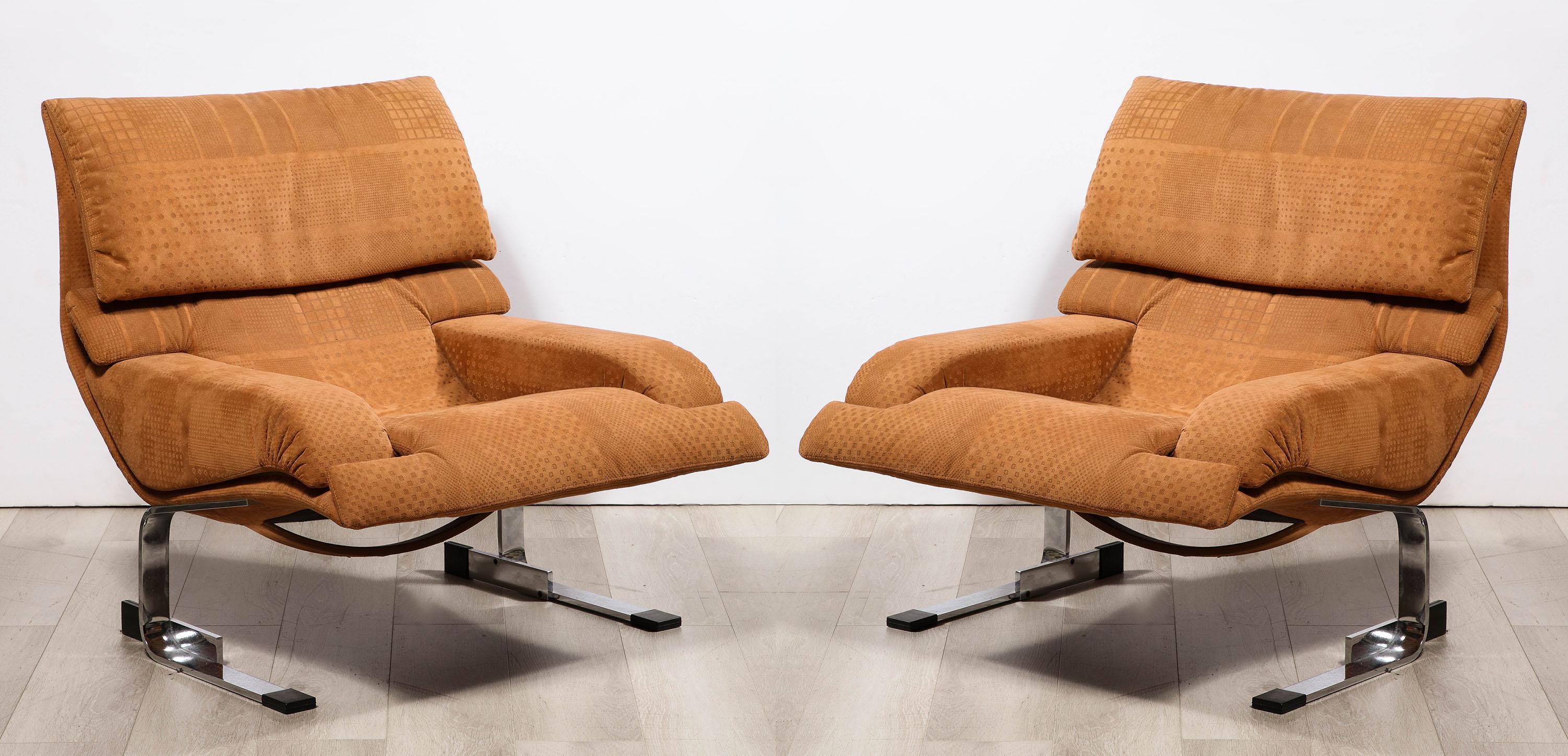 Pair of Saporiti Italia Onda lounge chairs
designed by Giovanni Offredi, with upholstered seats over chromed cantilever legs. 
Having original leather label under seat cushion.