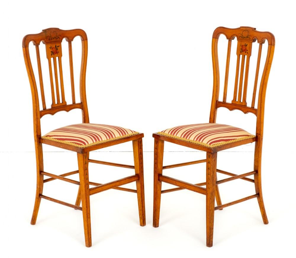 Pair of Satinwood Bedroom Chairs.
 
These Rather Pretty Chairs Feature Hand Painted Decoration to the Backs and the Legs.
 
The Chairs Have Recently Been Reupholstered.
 
Presented in Good Condition.
 
Size:
 
Height 38” (97cm)
 
Width 16 1/2”