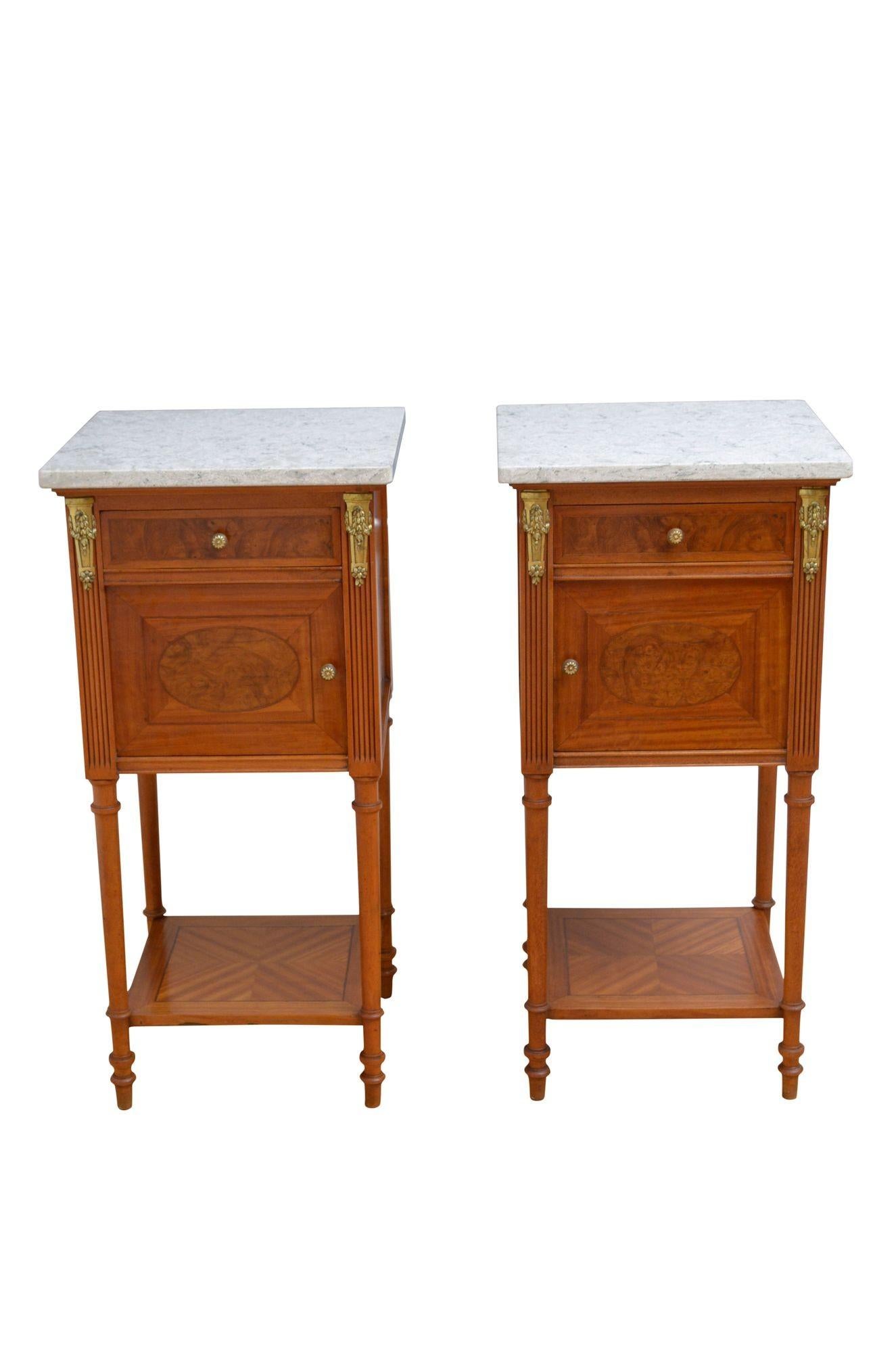 P0267 an attractive pair of antique bedside cabinets in satinwood, each having oversailing granite top with rounded corners, above oak lined drawer and finely inlaid cabinet door all fitted with original brass handles and enclosing original