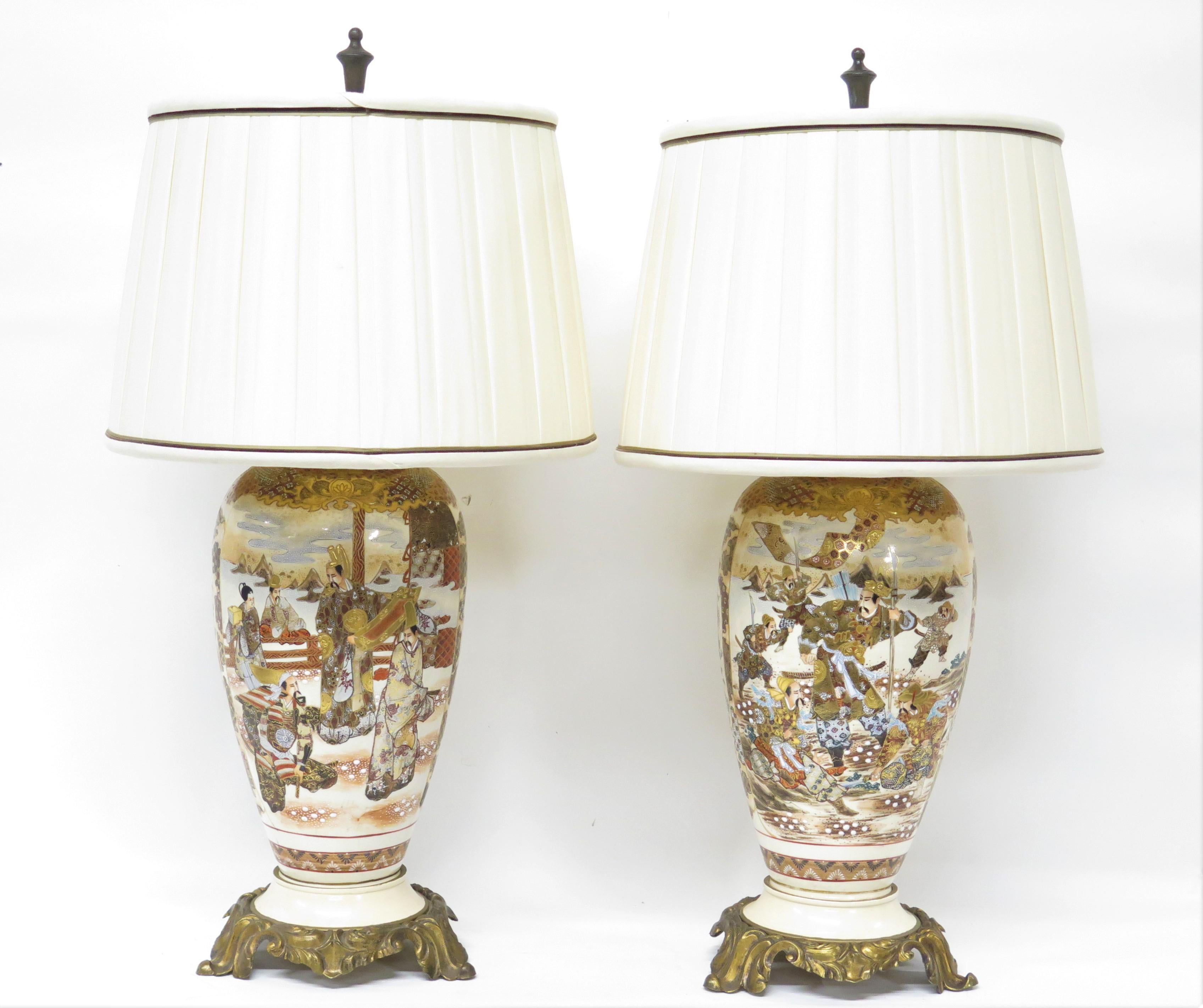 Pair of Satsuma vases on later bronze bases as lamps with custom shades, Japan. Late 19th/ early 20th Century.