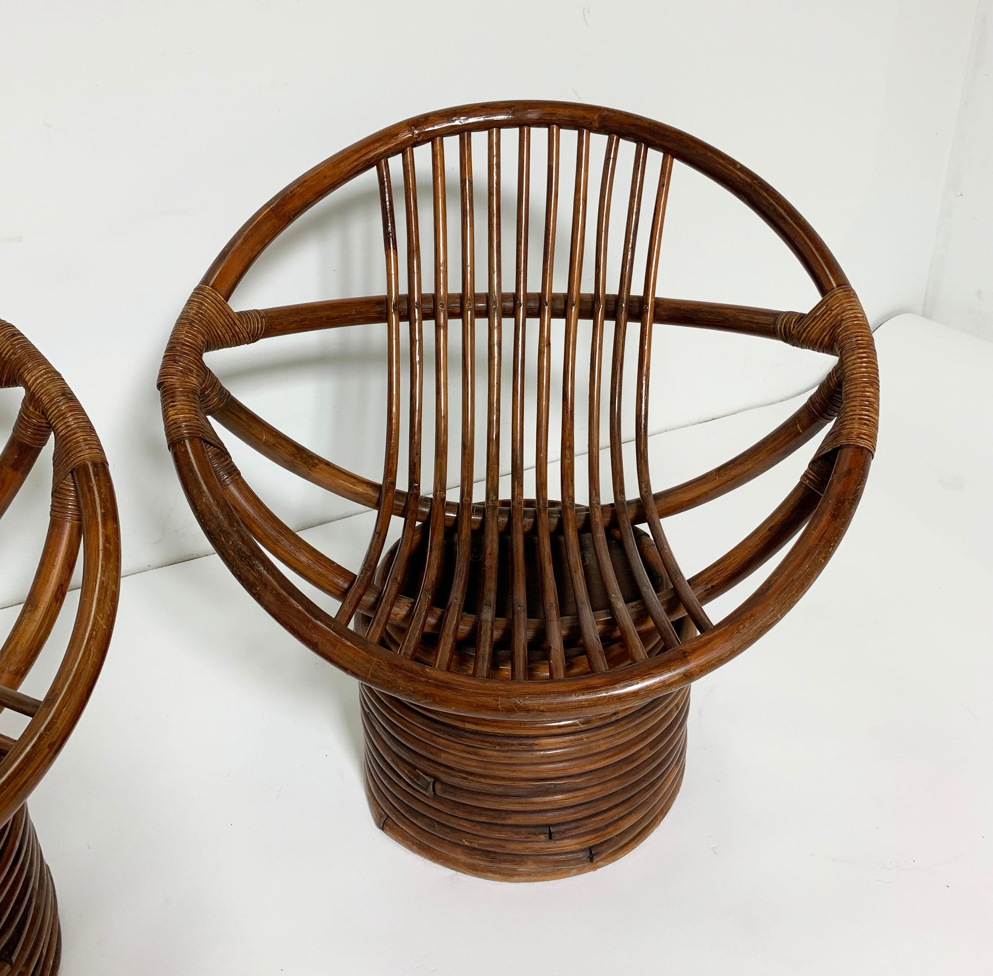 Pair of Saucer Form Swivel Lounge Rattan Chairs, circa 1960s In Good Condition In Peabody, MA