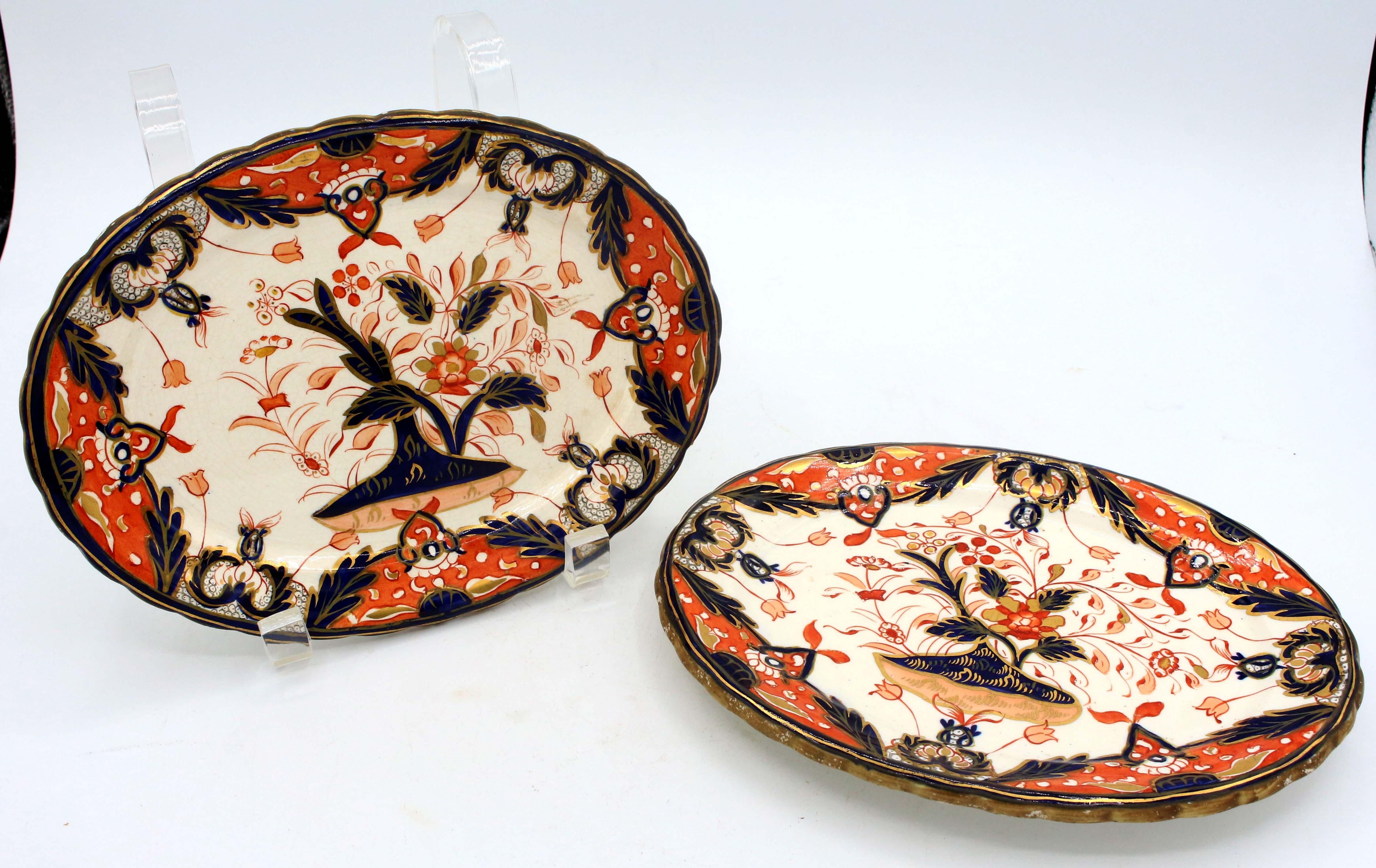 Pair of saucier stands, stoneware by Davenport, Imari pattern, late 19th century. Impressed registry & Davenport marks on one, both with retailer stamp in Manchester (Bandbach & Co, King St). Registry: March 13, 1879.
8 1/8