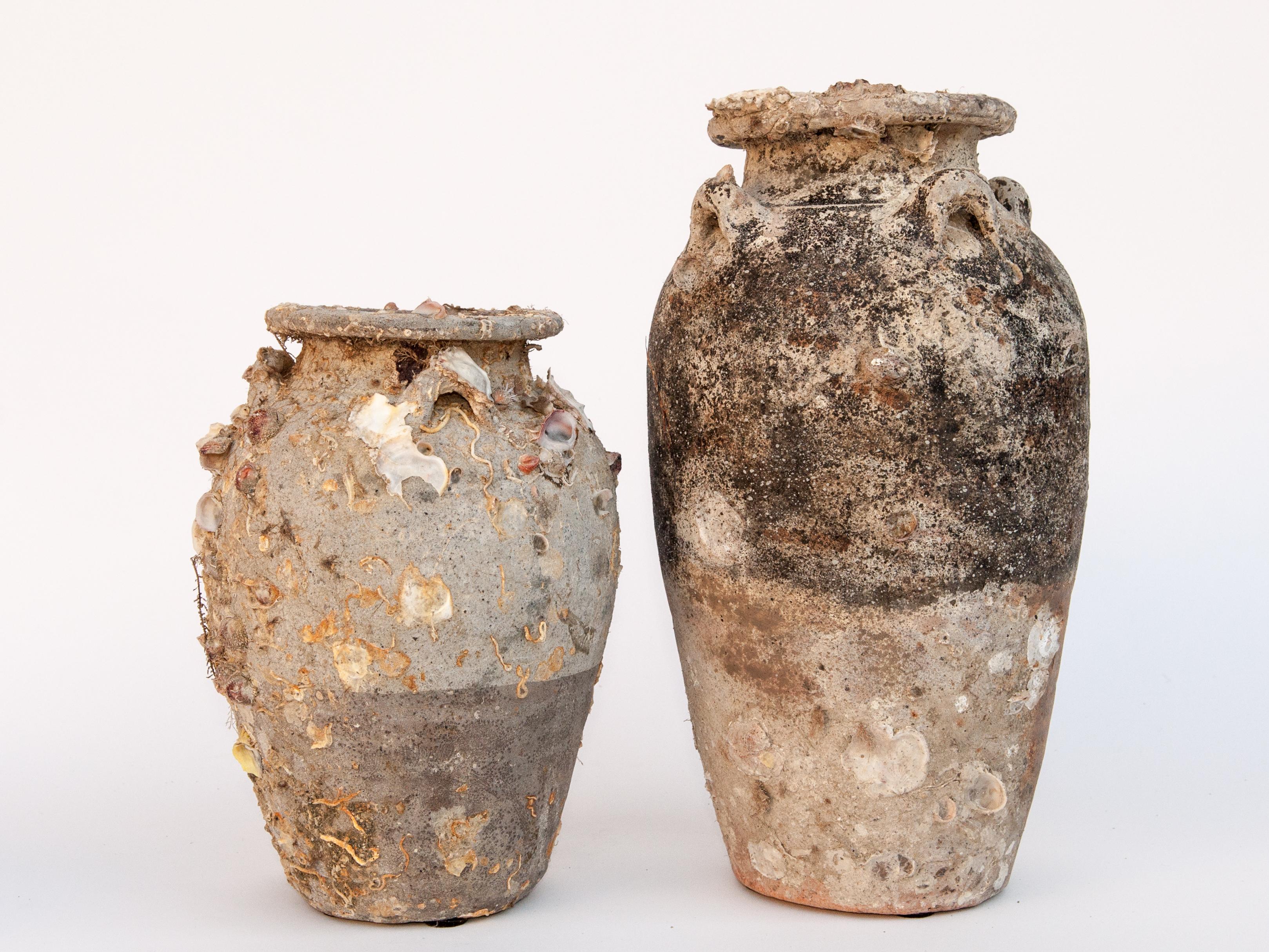 Pair of Sawankhalok Jars with Encrustations. Sawankhalok, Thailand, 15th century.
These jars originate from the kilns of central Thailand centered around the area of Si Sachanalai dating to the Sukhothai period. Sawankhalok ceramics were widely