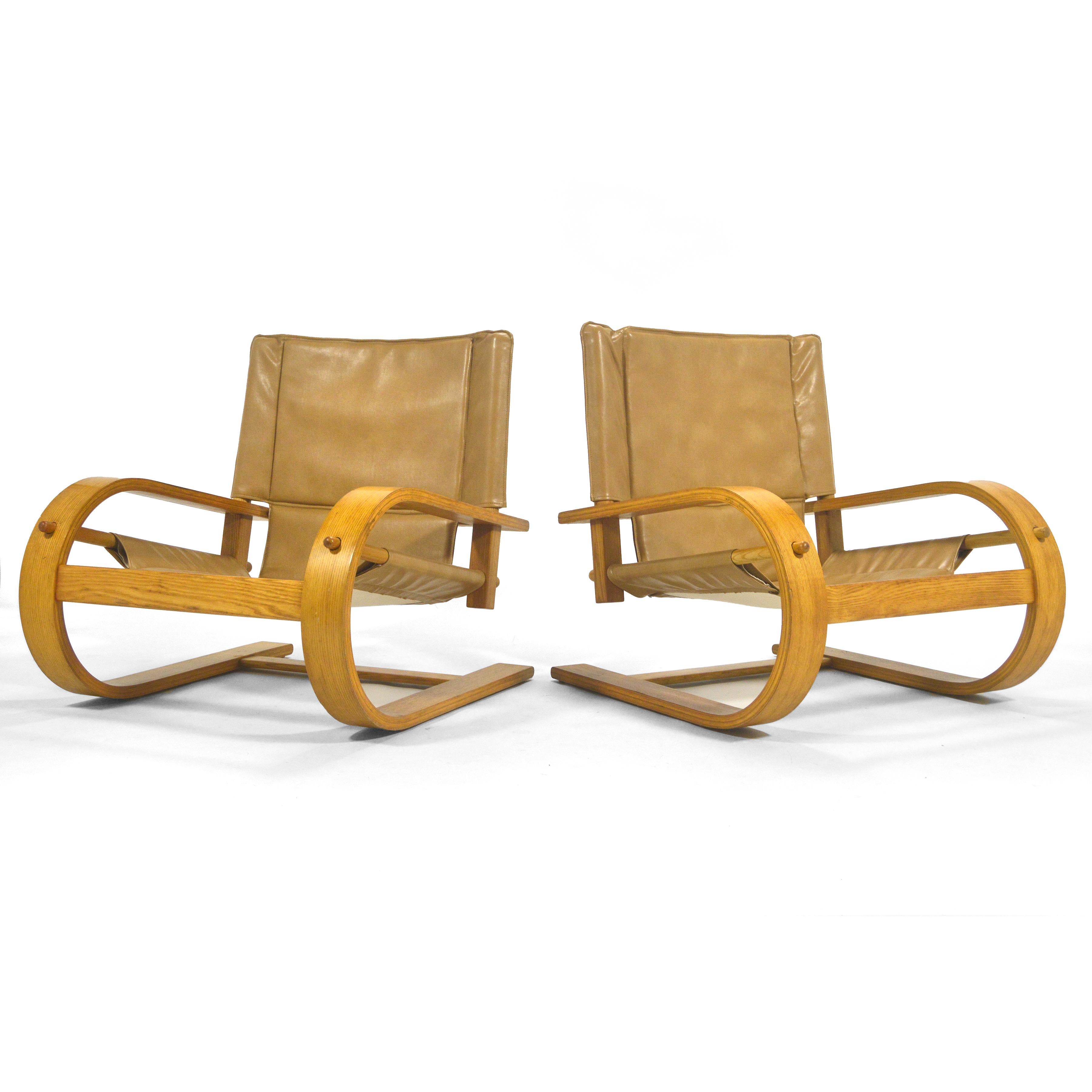 Designed by Gionathan de Pas, Donato D’Urbino and Paolo Lomazzi in 1976 for Poltronova, these generous lounge chairs have cantileviered frames of laminiated wood reminicent of Aalto that support a leather sling seat.