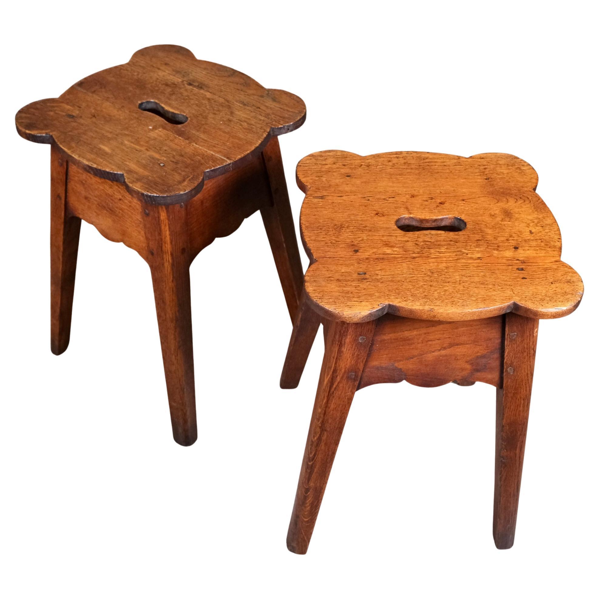 Pair of scalloped wood stools, Art Deco, France, early 20th century