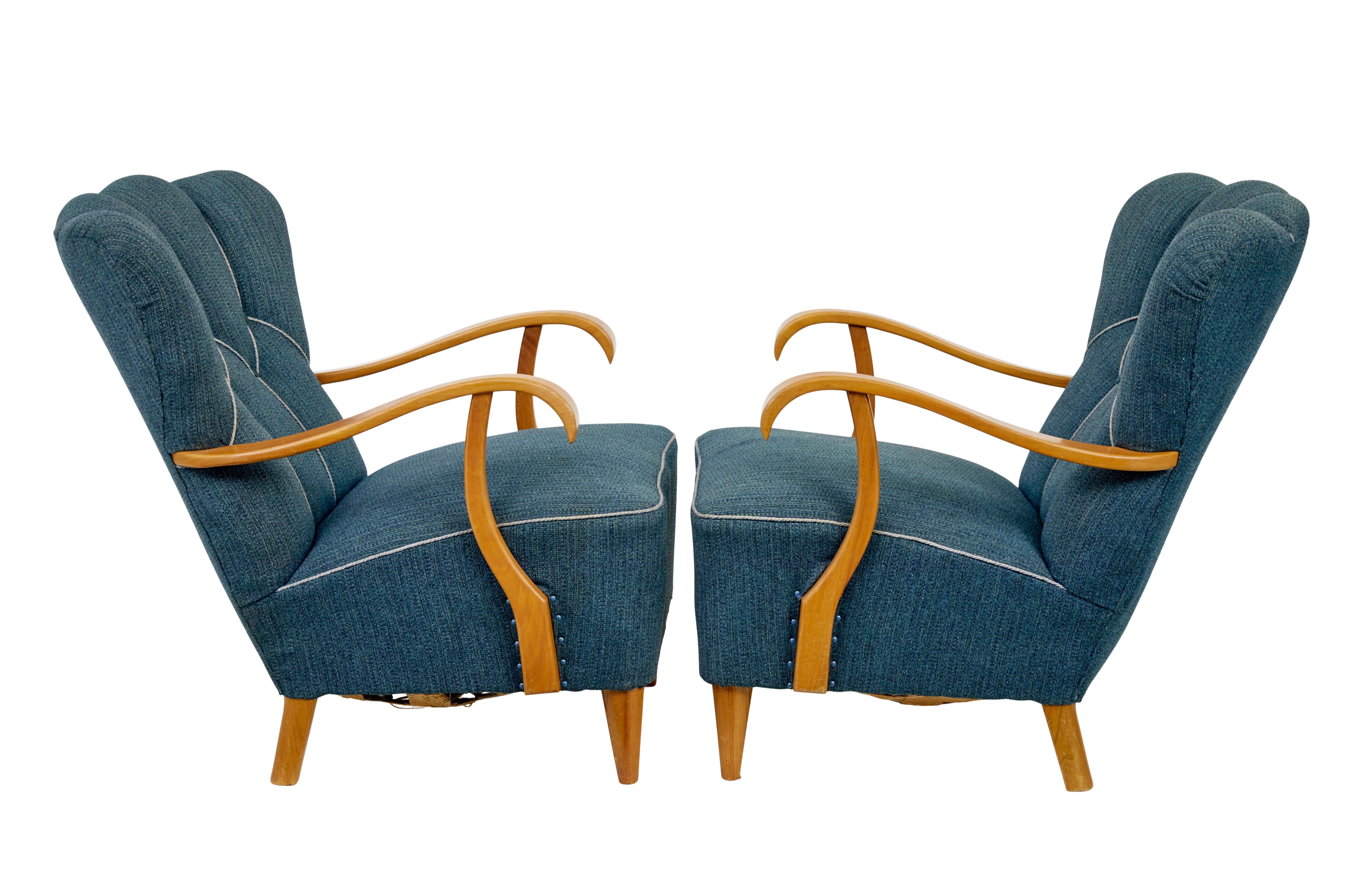 Hand-Crafted Pair of Scandinavian 1950’s shell back armchairs For Sale