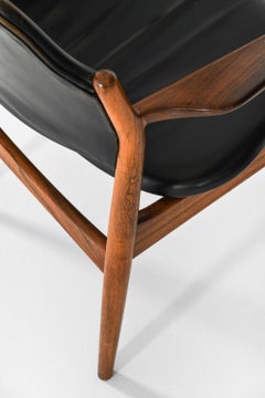 Coppia di poltrone scandinave in pelle e palissandro di Arne Vodder, anni ’60