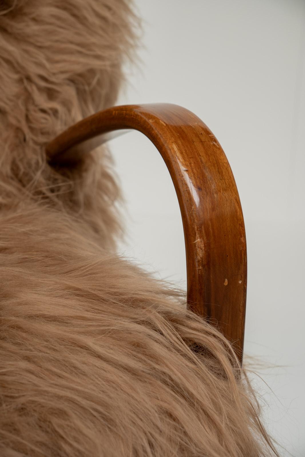 Coppia di poltrone scandinave in pelle di pecora a pelo lungo, anni '50 in vendita 4