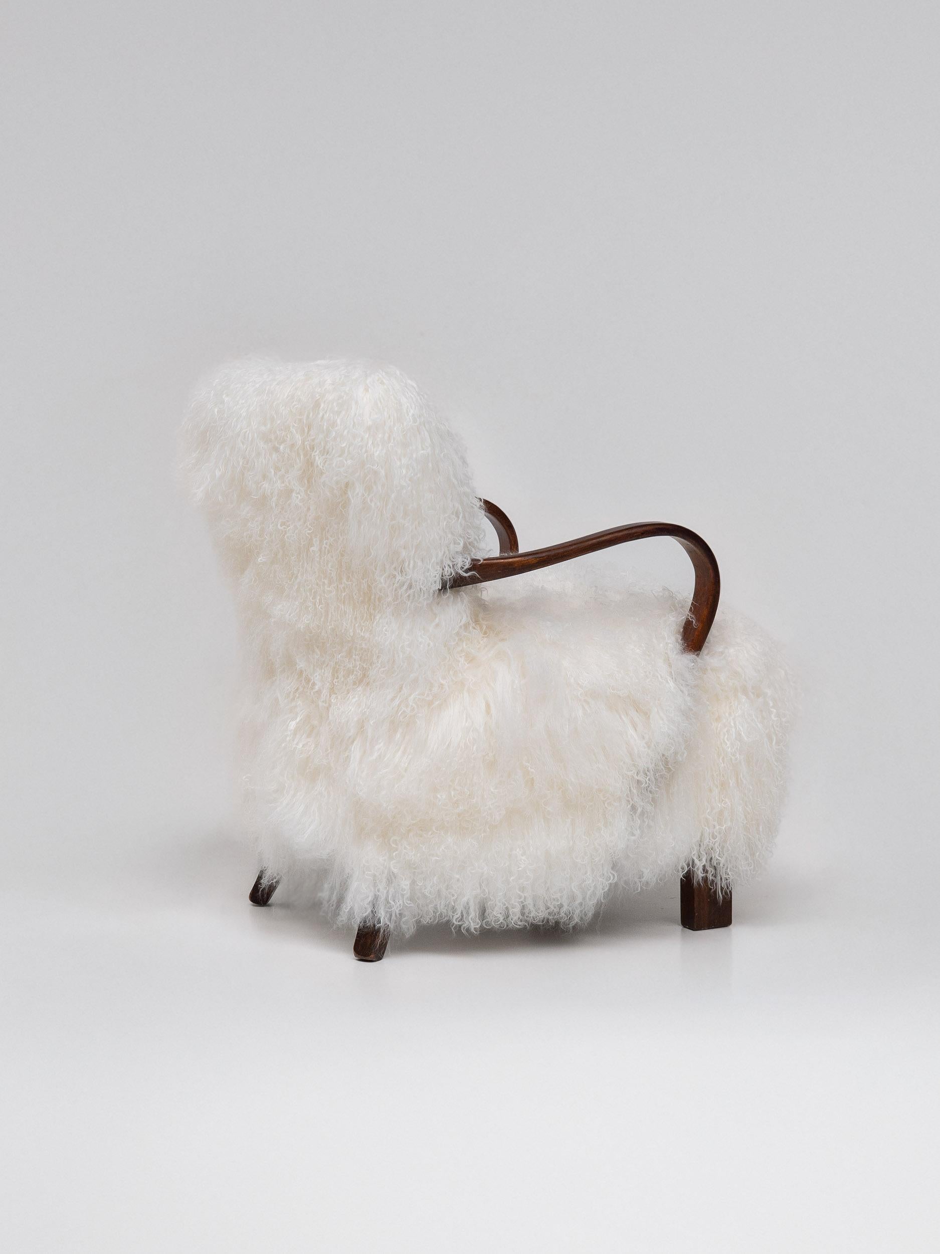 Montone Coppia di poltrone scandinave Art Déco in pelle di pecora della Mongolia, anni '50 in vendita