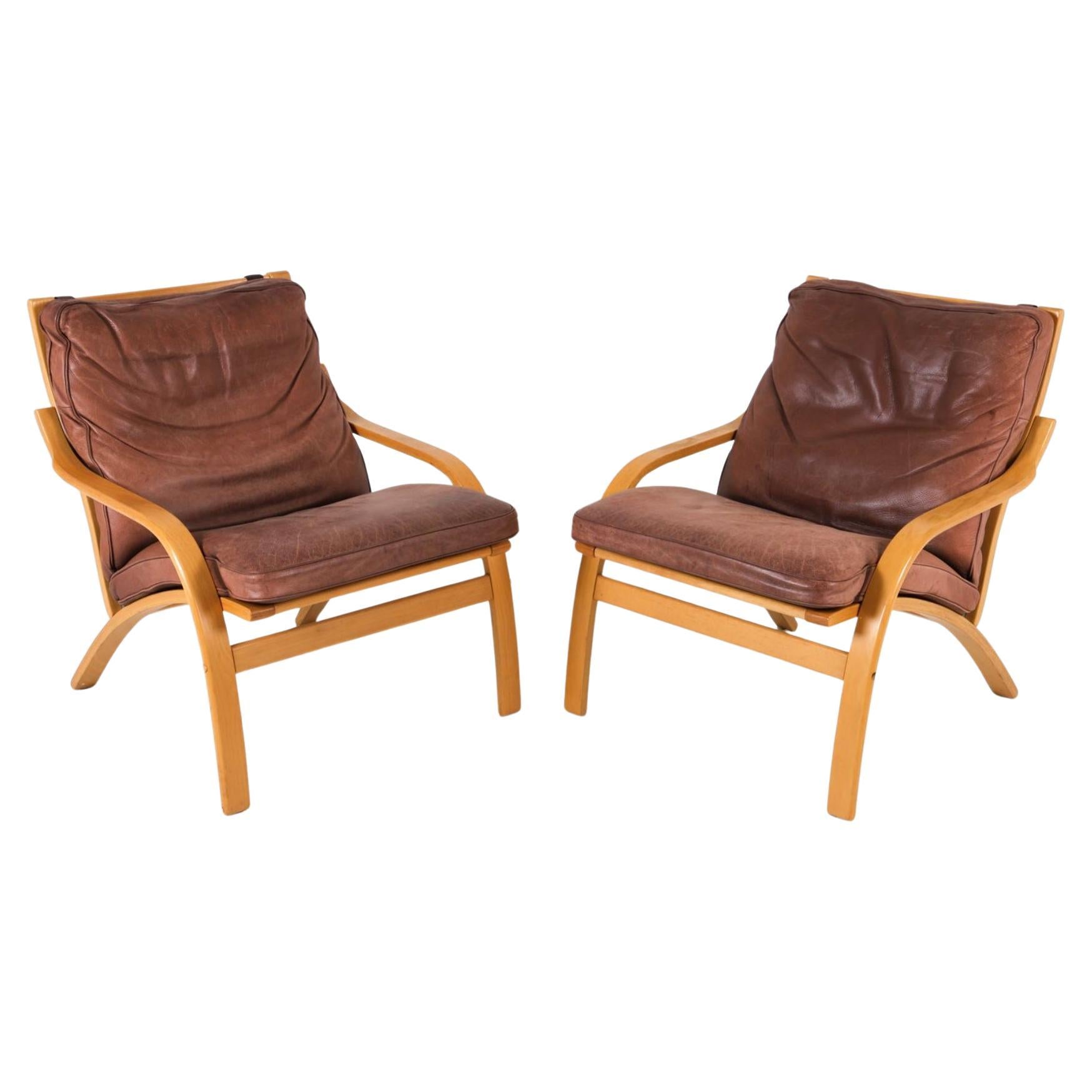 Danish Pair of Scandinavian Brown Leather and Curved Beech wood lounge chairs For Sale