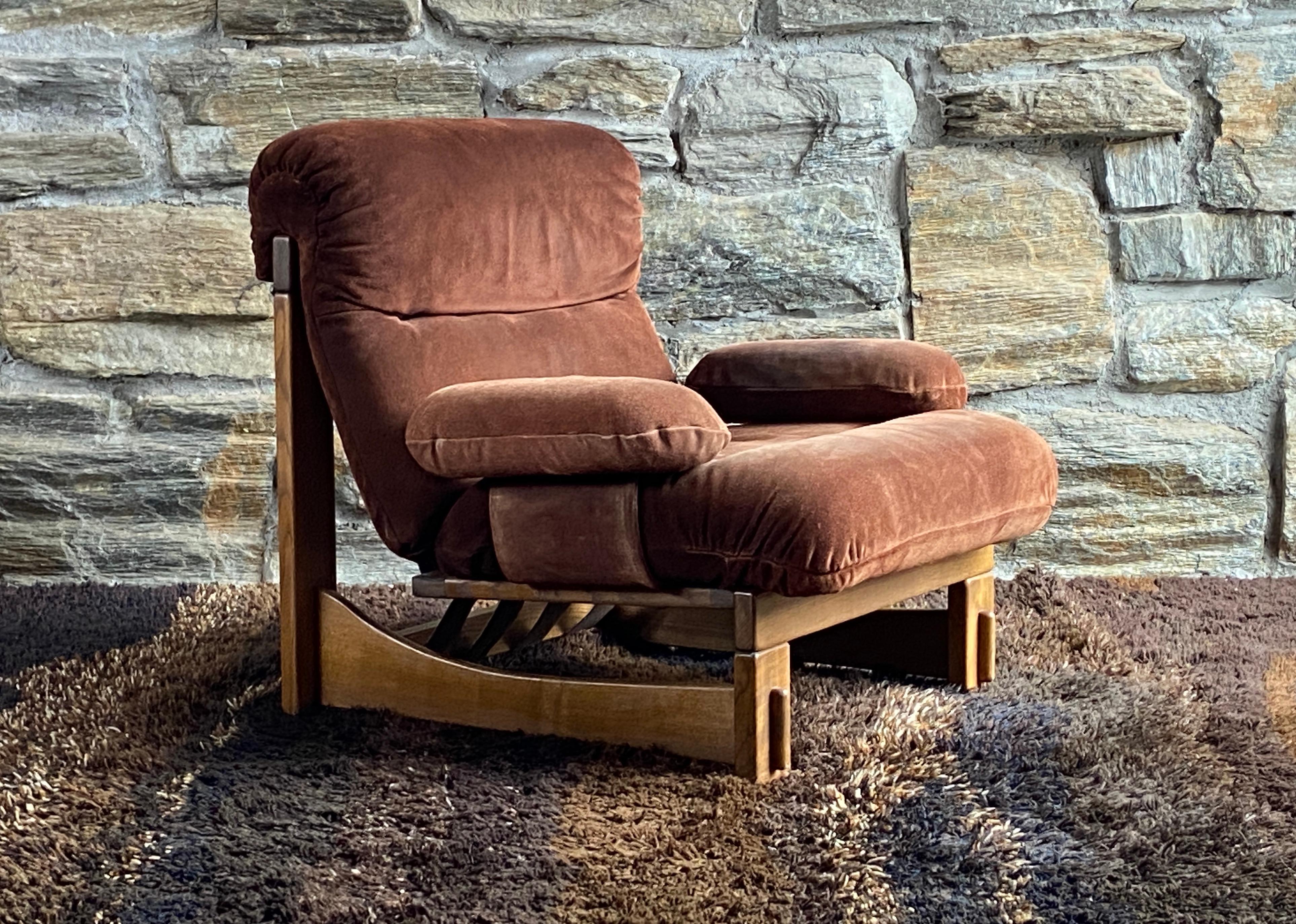 Amazing pair of  oversized mid century Scandinavian styled German brutalist lounge chairs. The heavy oak frames have beautifully crafted  through mortis and tenon joinery, cushions are upholstered in a brown suede leather supported by sling straps,