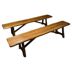 Pair of Scandinavian Brutalist style benches in solid elm, in the style of Olavi