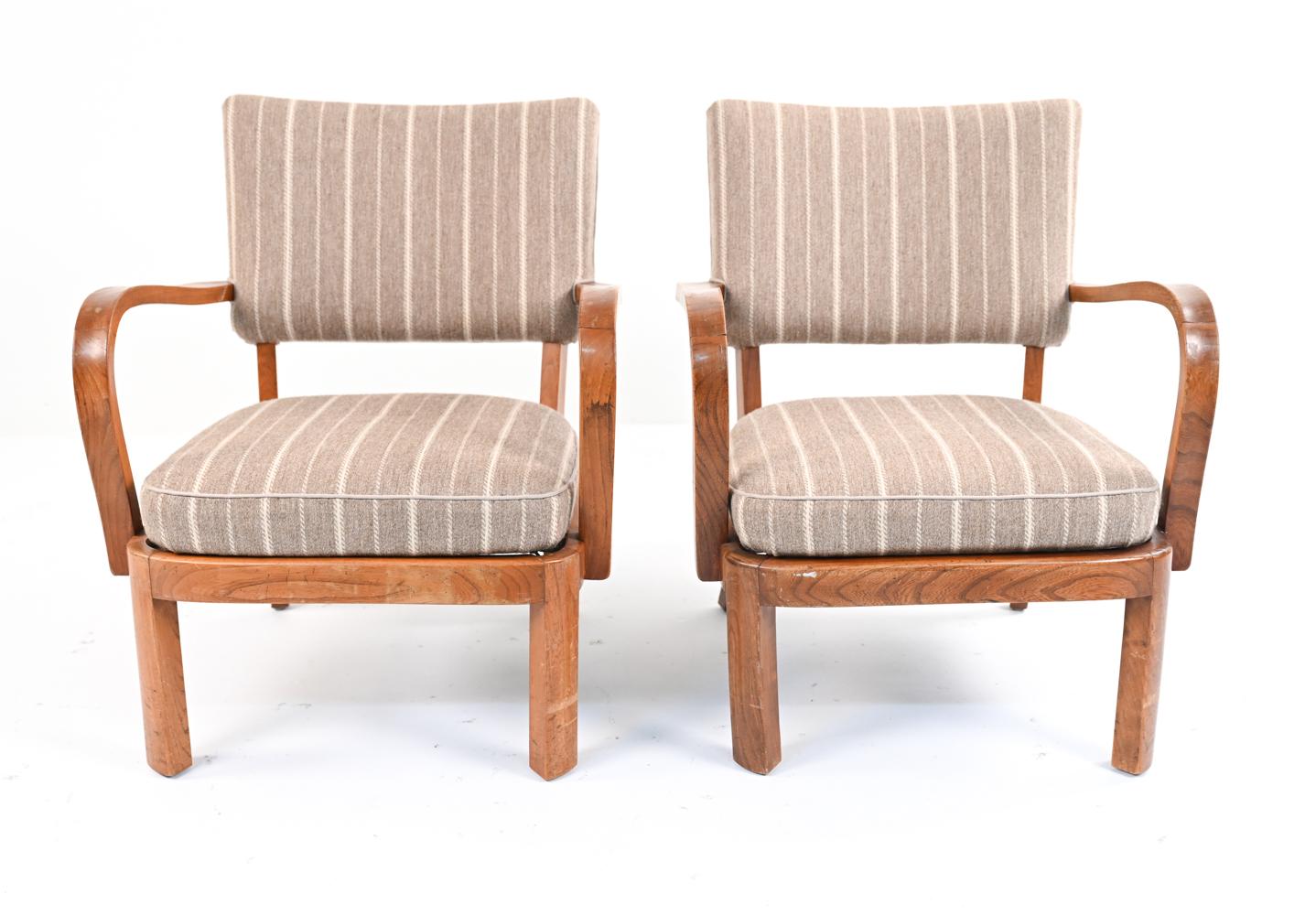 These rare armchairs, with their fine craftsmanship and rounded, clean lines - bridge the gap between the Art Deco and Mid-Century styles, blending French Modernism with Scandinavian practicality and proportions. They feature solid elm wood frames,