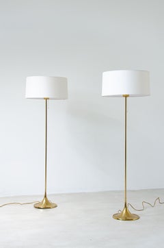 Pair of scandinavian floor brass lamps