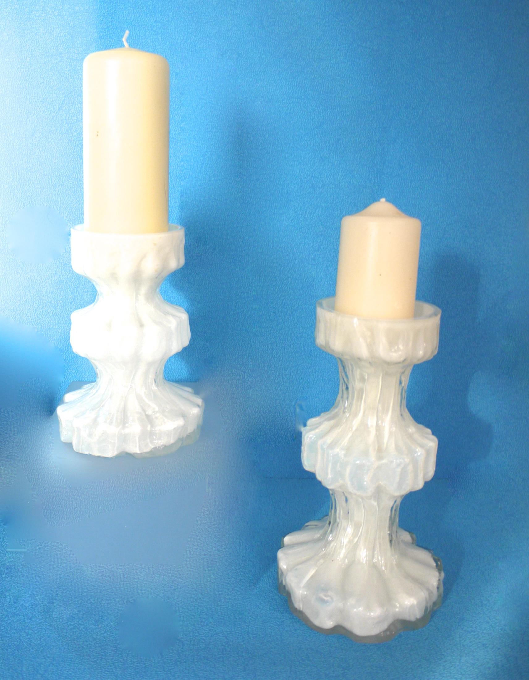 Pair of Scandinavian white glass candlesticks Ingrid Glasshutte mid-1960s Space Age 

Ingridglas is also known as Ingrid Glashütte, Ingridhütte, IG Glass and Ingridglaser. This company was set up in the 1960s and folded in 1979. Among other glass