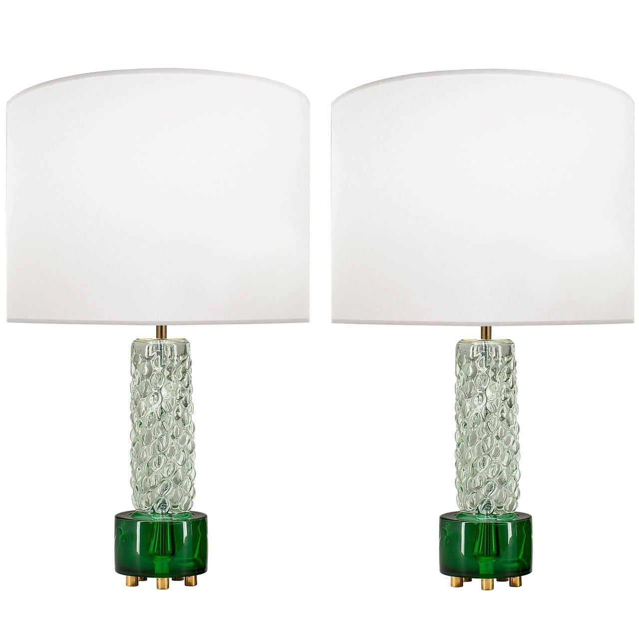 Pair of green and clear glass lamps with brass feet and hardware.

Scandinavian, Circa 1960's

Lamp Shades Are Not Included.

If you are interested in Lamp Shades, please email The Craig Van Den Brulle Design Team Via Message Center, and we will