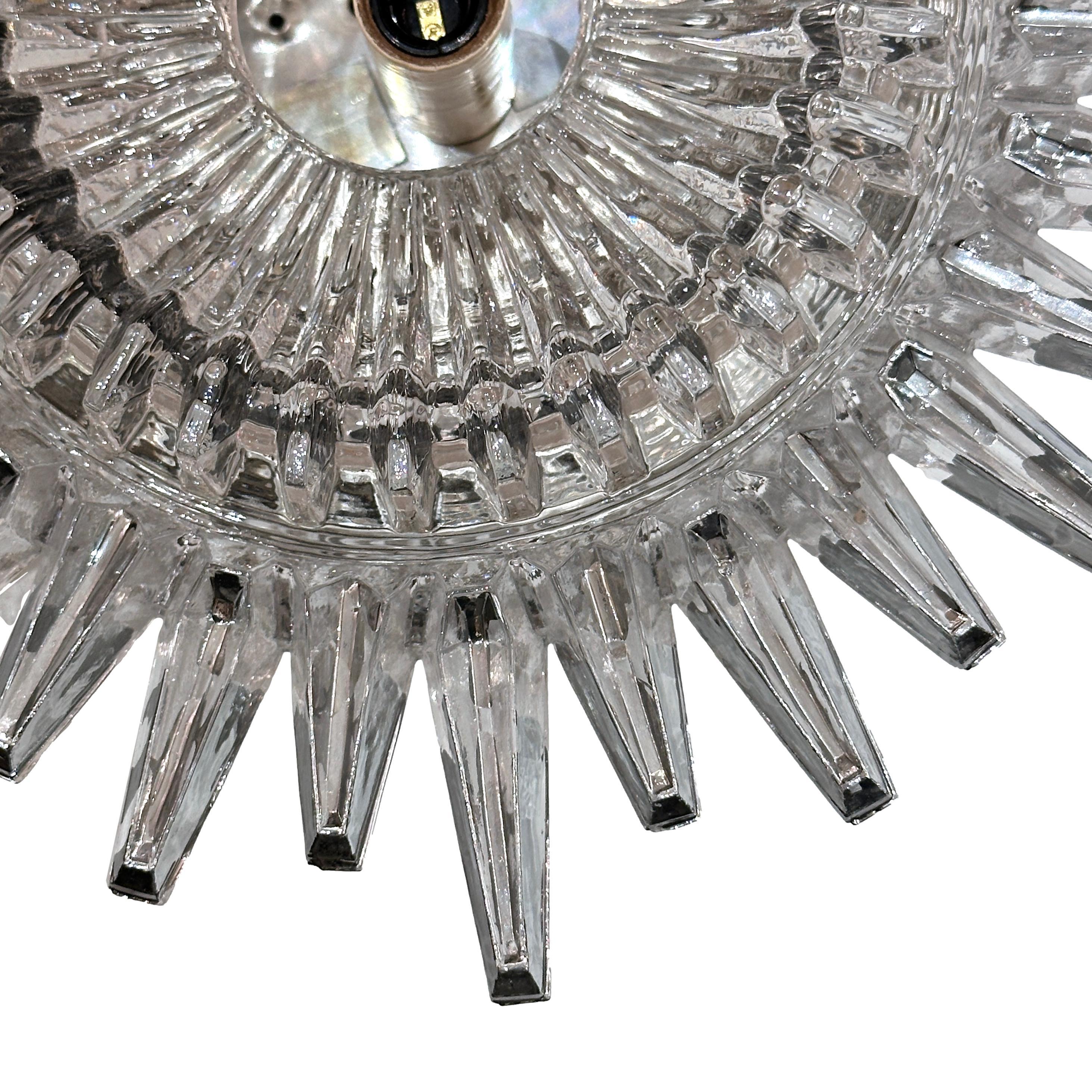 Pair of circa 1960's Swedish molded glass light fixtures with mirrored details. Sold individually.

Measurements:
Drop: 5