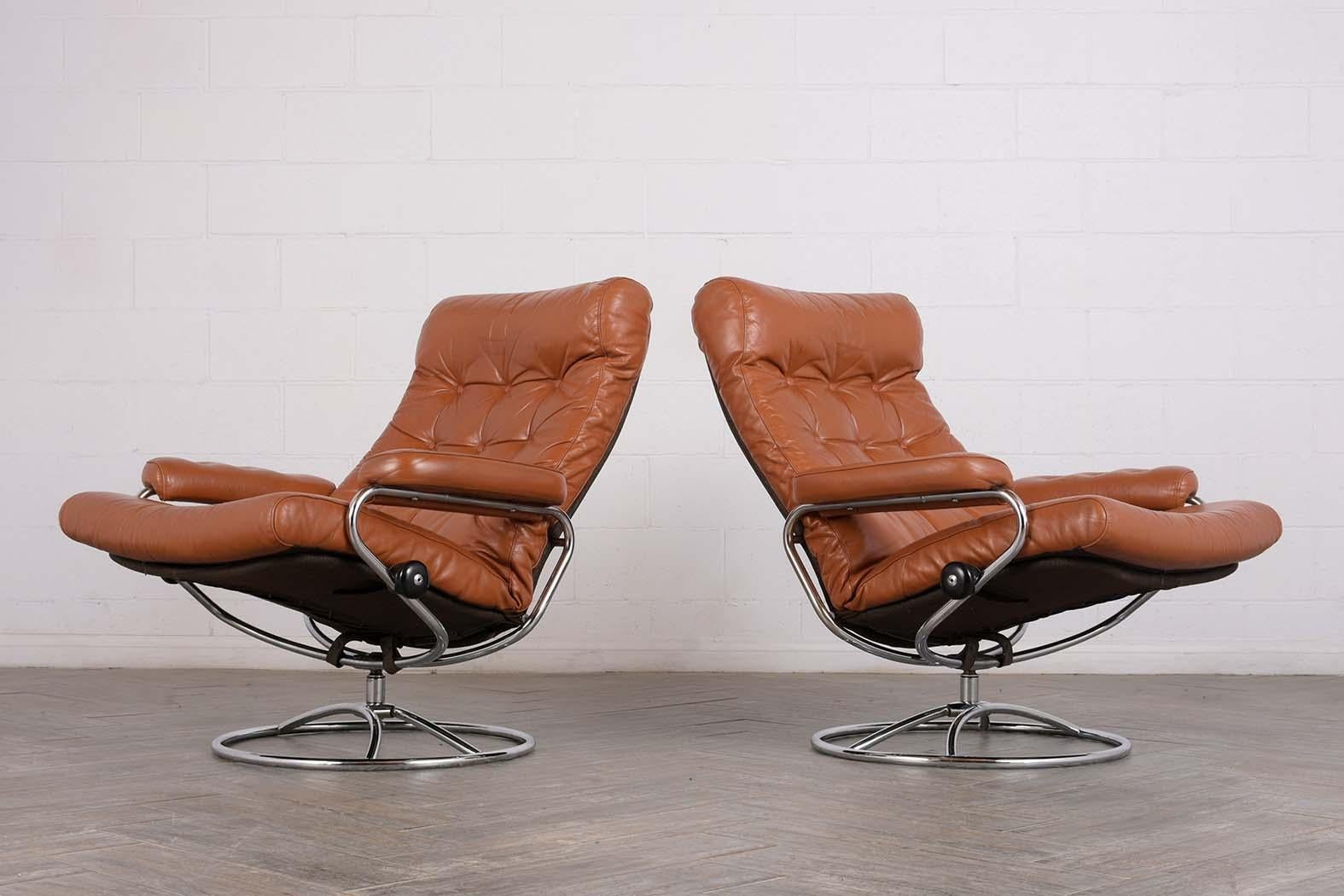 Norwegian Pair of Scandinavian Leather Swivel Reclining Lounge Chairs