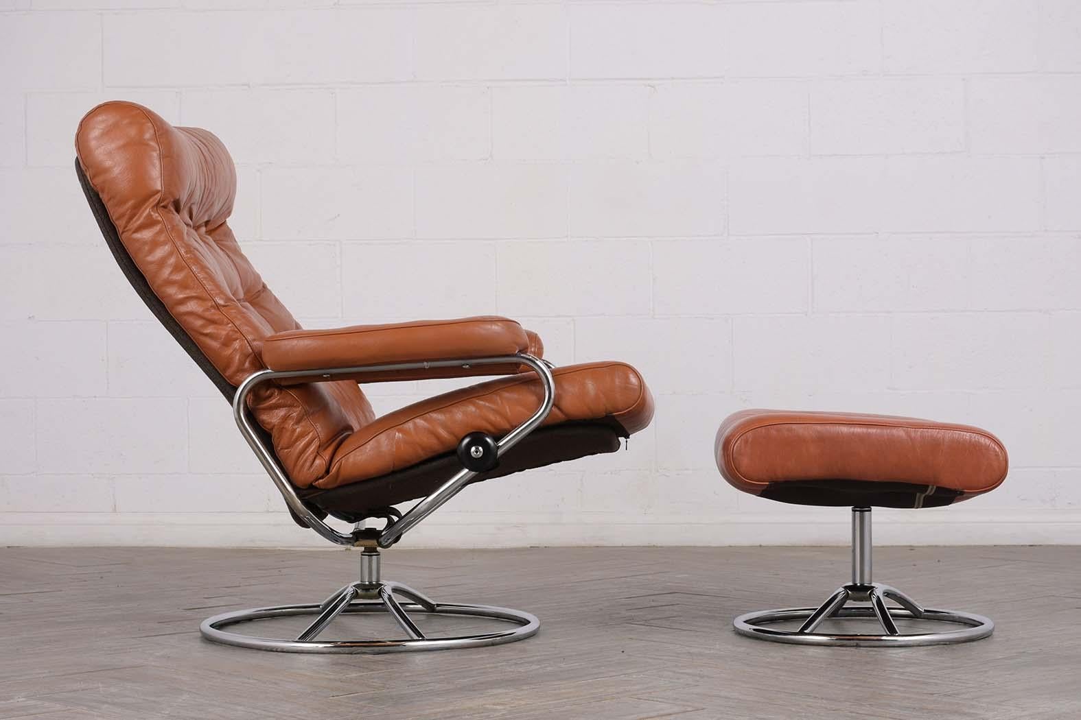 Late 20th Century Pair of Scandinavian Leather Swivel Reclining Lounge Chairs