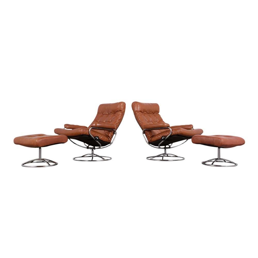 Pair of Scandinavian Leather Swivel Reclining Lounge Chairs